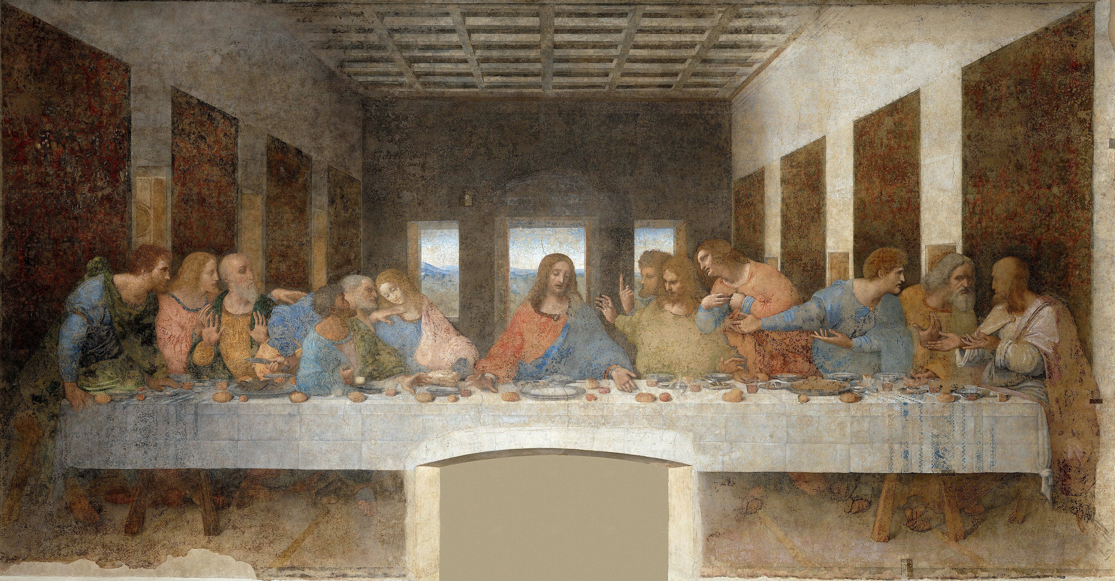 Leonardo: Christ and twelve apostles at a long table in a room with receding perspective.