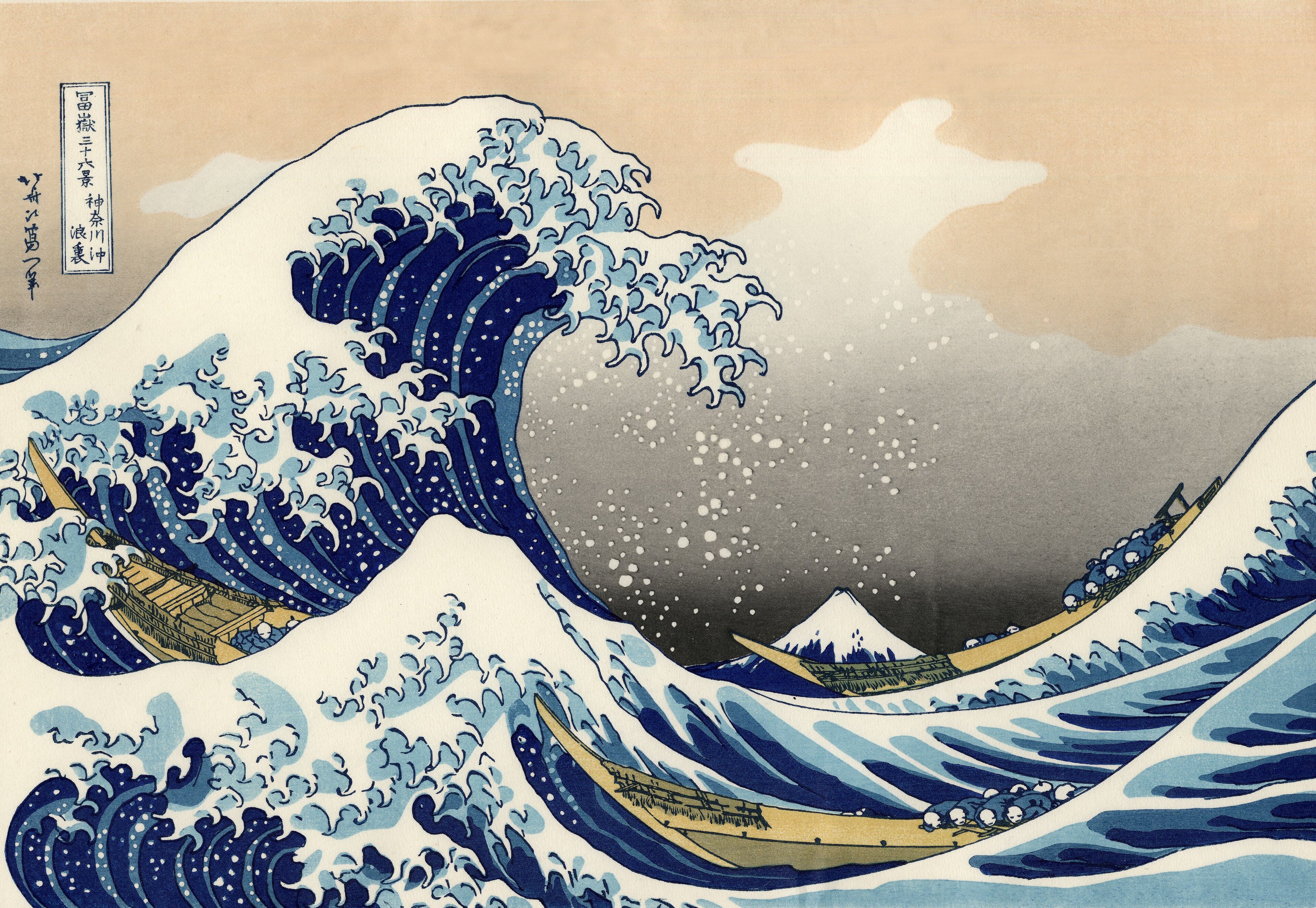 Hokusai: a towering blue wave curling over narrow boats with Mount Fuji in the distance.