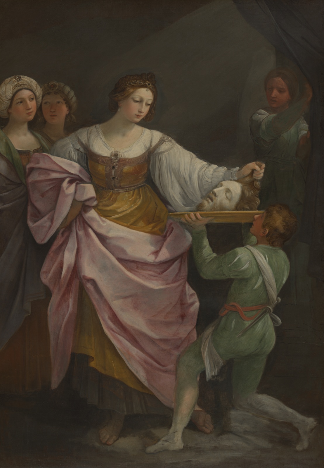 Large painting of woman, in gold and pink dress, placing severed head on platter.