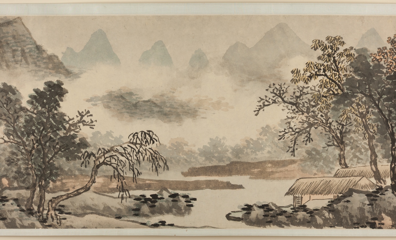 A work made of handscroll; ink and color on paper.