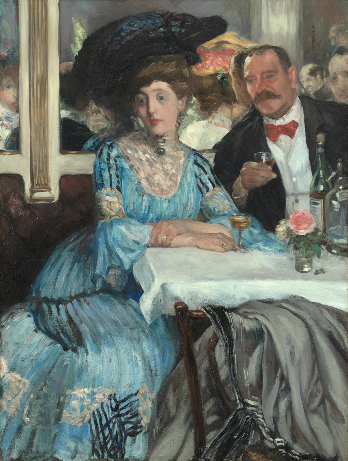 Opulently dressed light-skinned man and woman drink at a small table. A mirror behind them reflects a crowd. Her blue dress and dark hat dominate.