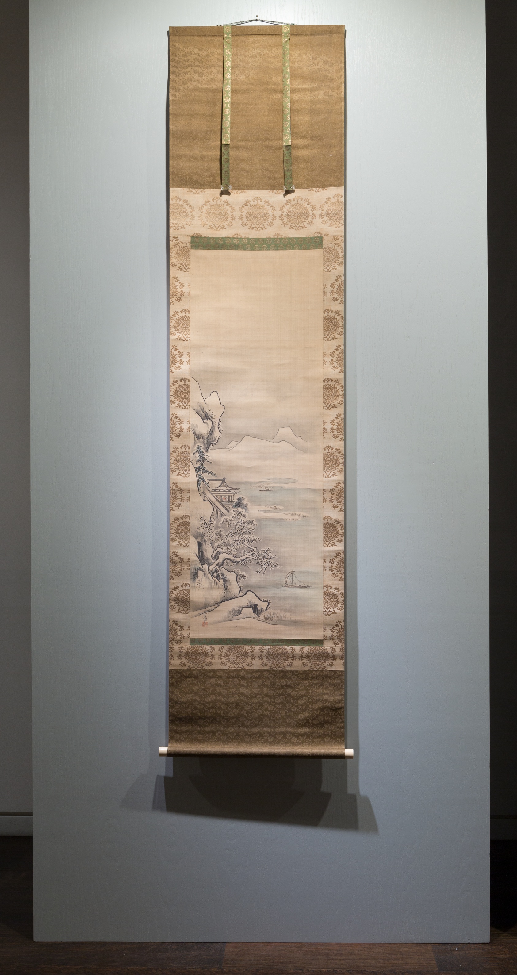 A work made of triptych of hanging scrolls; ink and light colors on silk.
