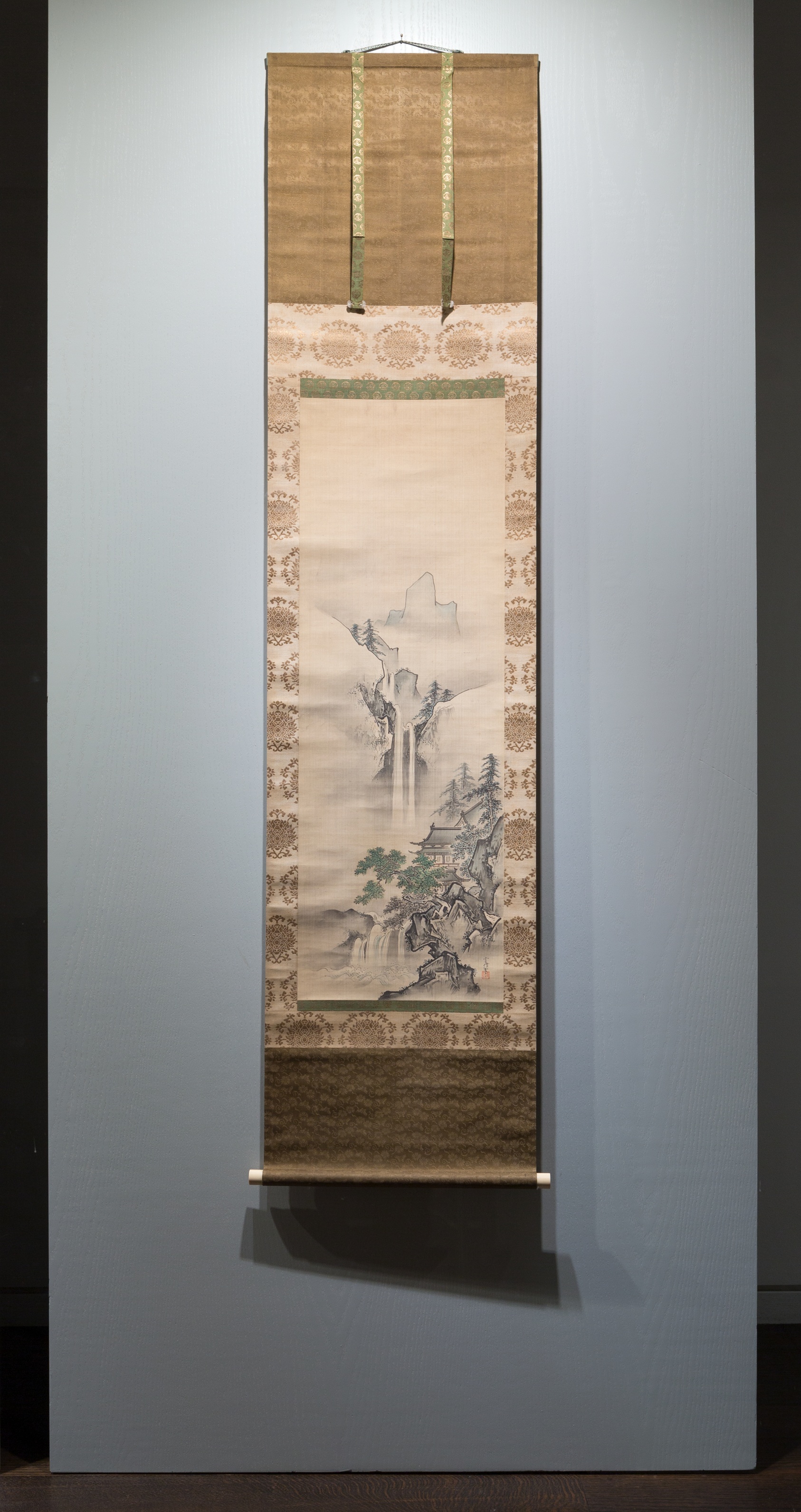 A work made of triptych of hanging scrolls; ink and
light colors on silk.