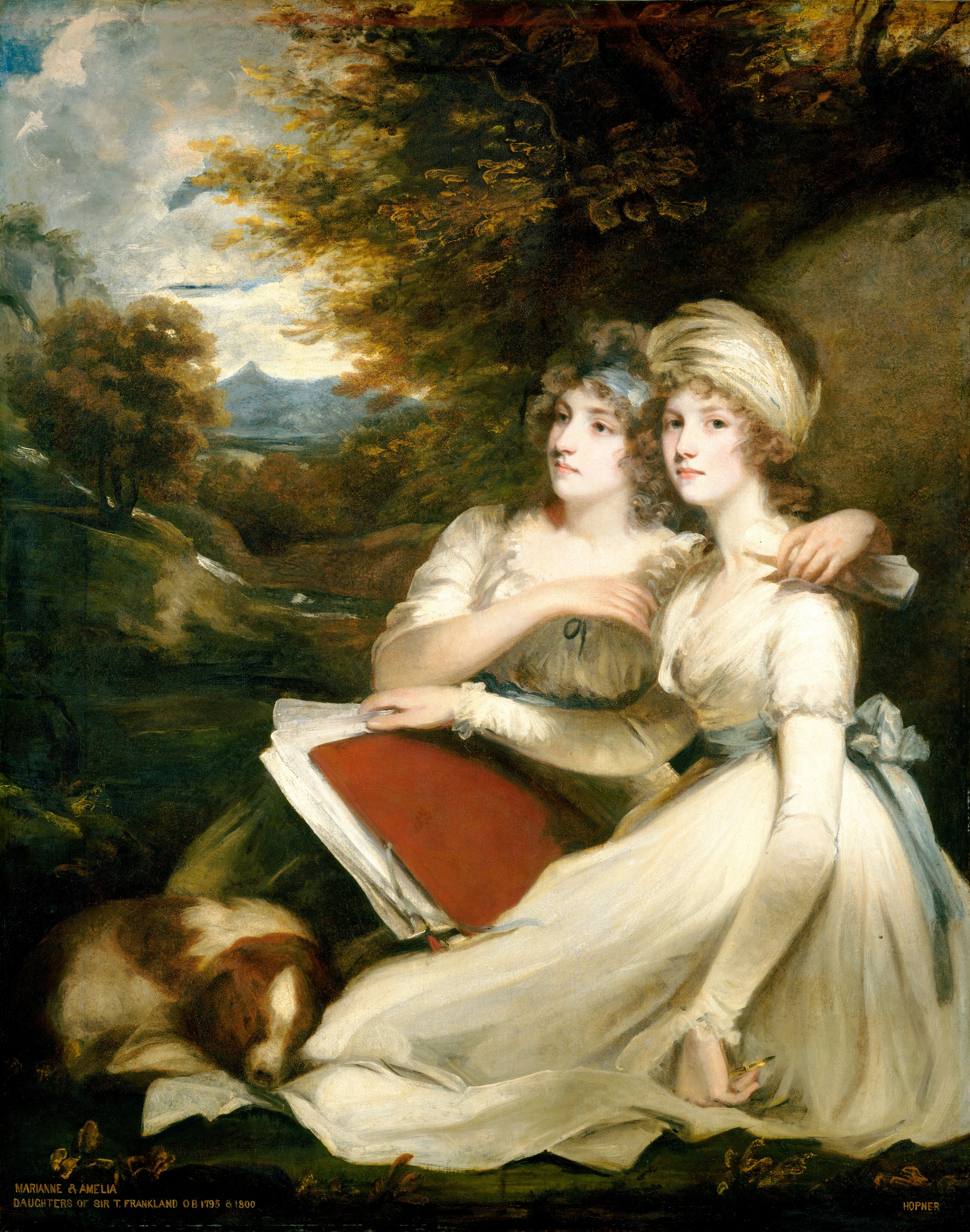 In this painting, two young women are depicted sitting closely together. They are positioned side by side, with the woman on the left slightly leaning against the other woman and looking to the right, while the woman on the right looks out at us. Both women have pale skin and light eyes, and they wear neutral expressions. The woman on the left has curly brown-and-gray hair adorned with a light blue ribbon, while the woman on the right has her blonde hair styled under a cream-colored bonnet. Both are dressed in elegant, high-waisted white gowns tied at the waist with pale blue sashes. The woman on the left has her arm around the other woman's shoulders, and she holds a paper scroll in one hand. The woman on the right holds a large red folder filled with several white papers in her right hand, and she holds something small and gold in her other hand. On the left, a sleeping brown-and-white dog rests at their feet, nestled into the fabric of the women's skirts. Tall, dark trees are behind the women in the upper right corner, while the background in the upper left corner showcases a serene, hilly landscape featuring olive-green foliage and a distant view of a tall blue mountain under a partly cloudy light blue sky.