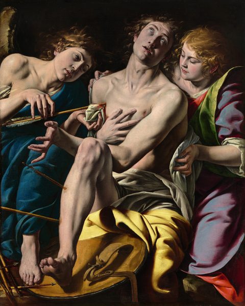 Bright light from the upper left washes over a young man pierced with arrows, an angel, and a young woman, who together fill this vertical painting. The three cluster closely against a black background, and all of them have pale, peachy skin. The muscular young man at the center, Saint Sebastian, faces us and appears to be seated with his right leg bent, to our left. The heel of that foot is braced on a round, golden brown object that might be the back of a shield. Saint Sebastian’s shin is pierced by two arrows. His head is thrown back as his glistening brown eyes roll back to gaze up and his mouth hangs open. He touches his chest near one wound, near his left shoulder, to our right. His other wrist rests against his bent knee, and the palm of that hand faces our left, fingers splayed back. He is nude except for silver-gray and goldenrod-yellow cloths draped across his lap and left leg. To our left, the angel, wearing a long, sapphire-blue toga, leans toward Saint Sebastian with shoulders squared to us. The angel’s head tips toward Saint Sebastian’s shoulder as he delicately draws an arrow from the saint’s chest and holds up a bloody cloth to staunch the wound. A sliver of a golden-brown wing shimmers against the ink-black background, near the left edge of the painting. Several blood-covered arrows sit near the angel’s feet, in the lower left corner of the painting. To our right, the woman stands close behind Saint Sebastian, wearing a plum-purple robe with emerald-green lining over a long, scarlet-red garment. She cradles Saint Sebastian’s body against hers, bracing him with her hands as she wraps the gray cloth around his back.