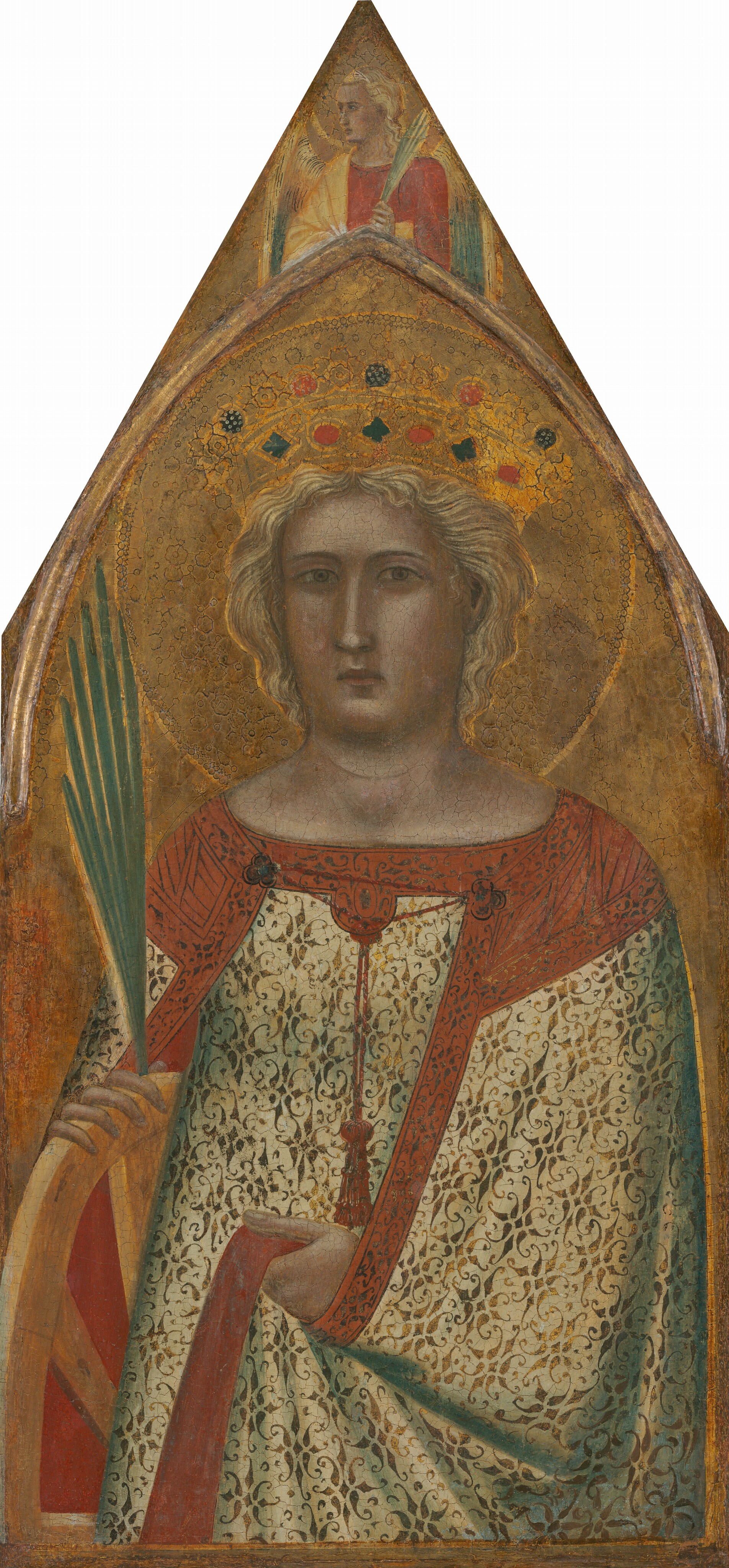 Shown from the hips up, a woman wearing a crown braces a wooden wheel against a gold background on a panel shaped to come to a sharp point at the top of this vertical painting. The woman’s pale skin is faintly tinged with green and gray. Her body faces us, and she looks at us with light brown, almond-shaped eyes. She has a long, straight nose, full cheeks, and her pink lips are closed. Her blond hair sweeps back from her face under the gold crown, which is set with blue and red gems. Her dress and cloak have gold leafy patterns against ivory white, and are edged with brick red. She wraps the cloak around her left elbow, to our right, and grips the fabric in that hand. The other elbow is slung over the wooden wheel, and she holds a palm frond in that hand. A gold halo is incised onto the background. Above the woman, narrow molding affixed to the panel creates a rounded but pointed arch set under the sharp point at the top of the panel. Between the arch and the triangular tip, an angel with yellow and blue wings and blond hair is shown from the chest up. The angel’s body faces us but the head is almost in profile to our left. A narrow palm frond is held by one shoulder, and a butter-yellow cloth drapes over a cardinal-red gown. The surface of the painting is cracked and chipped, especially in the gold areas. 
