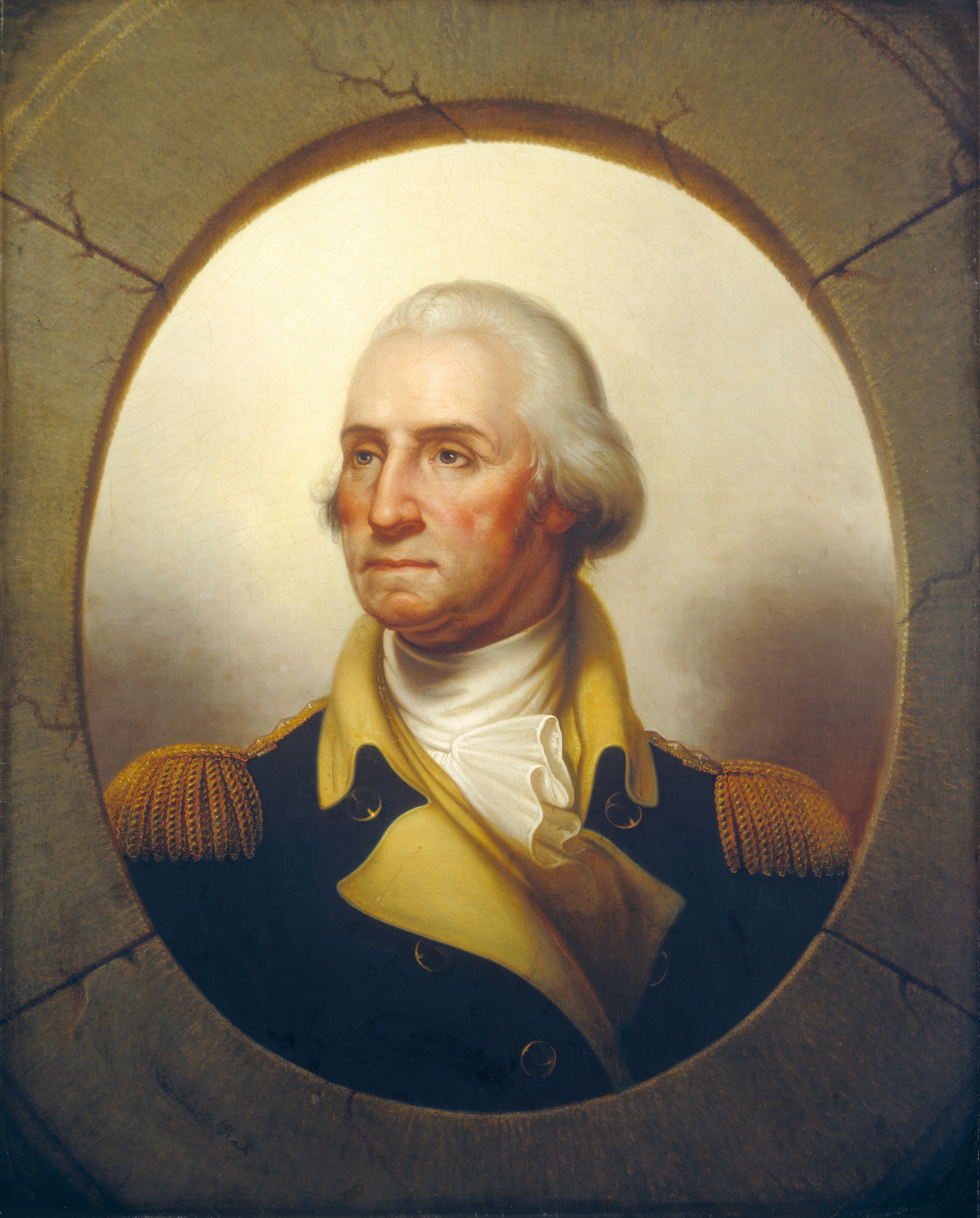 This painting shows a man from the chest up. The man's body faces us, while his head is turned to the left. His facial features include a broad forehead, strong nose, and thin lips. He has pale skin with rosy cheeks and thin, dark eyebrows. His hair is white and pulled back from his head, curling down around his ears. He is dressed in a military uniform that features a dark blue coat with gold epaulettes on the shoulders, gold buttons, and a prominent yellow collar. Underneath, he wears a ruffled white cravat. The background is a gradient of white and gray, lighter at the top and becoming darker behind the man's shoulders. The man is outlined in an oval, and beyond that oval is a cracked frame-like surface in shades of gray and light green, as if the man is looking through an oval window or porthole.
