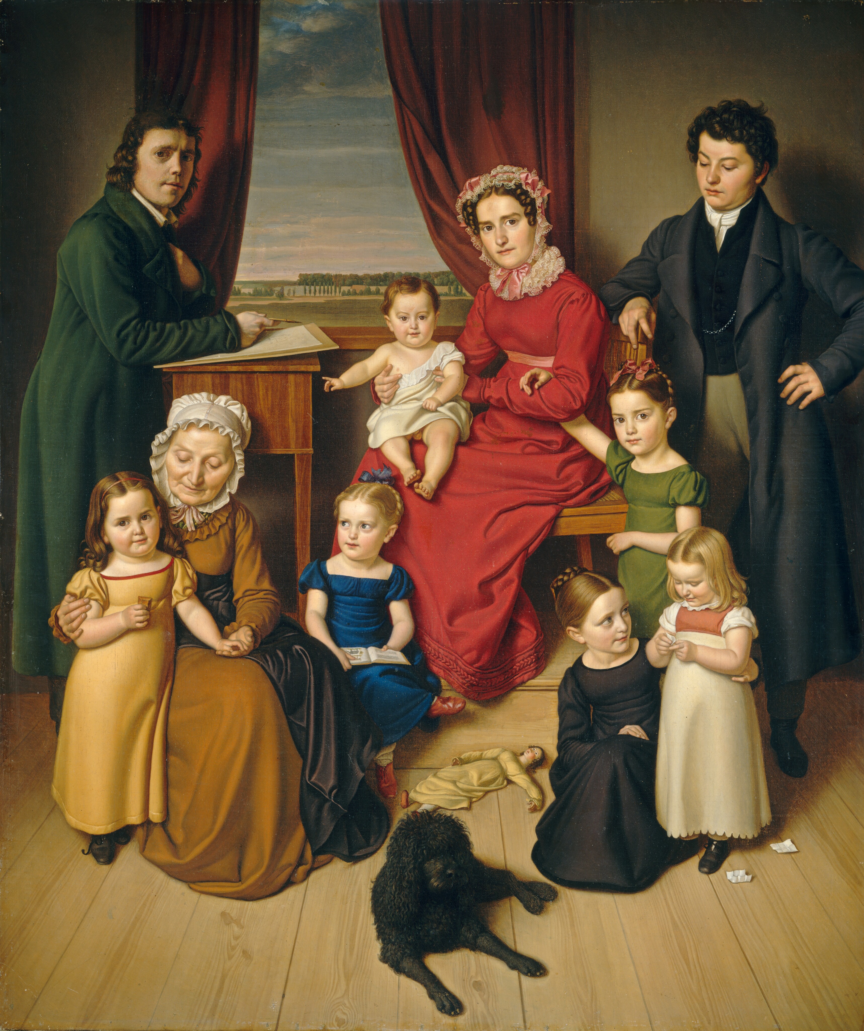 This painting shows a group of people in a room. In the center, a woman in a red dress and a red bonnet sits with a baby on her lap. A man stands to the left, leaning on a wooden desk or podium with a piece of paper on it, while another man stands on the right, leaning on the back of the woman's chair and looking down at her. An elderly woman is seated on the left beside the wooden desk, wearing a white bonnet and a dark yellow dress. Two girls are on either side of her, one standing and one sitting, reading a book. Another girl stands next to the woman in red, their arms linked together. Two other girls are on the right, one older girl crouching next to a younger girl who stands, holding a piece of paper in her hands. There are two scraps of paper on the ground next to her. A black poodle sits on the floor in the center of the children, and a doll is on the ground nearby. The background shows red curtains drawn back to reveal a landscape view through a window. The wall is gray, and the floor is pale wood. All of the people have pale skin, and hair ranging from black to light brown to pale yellow.