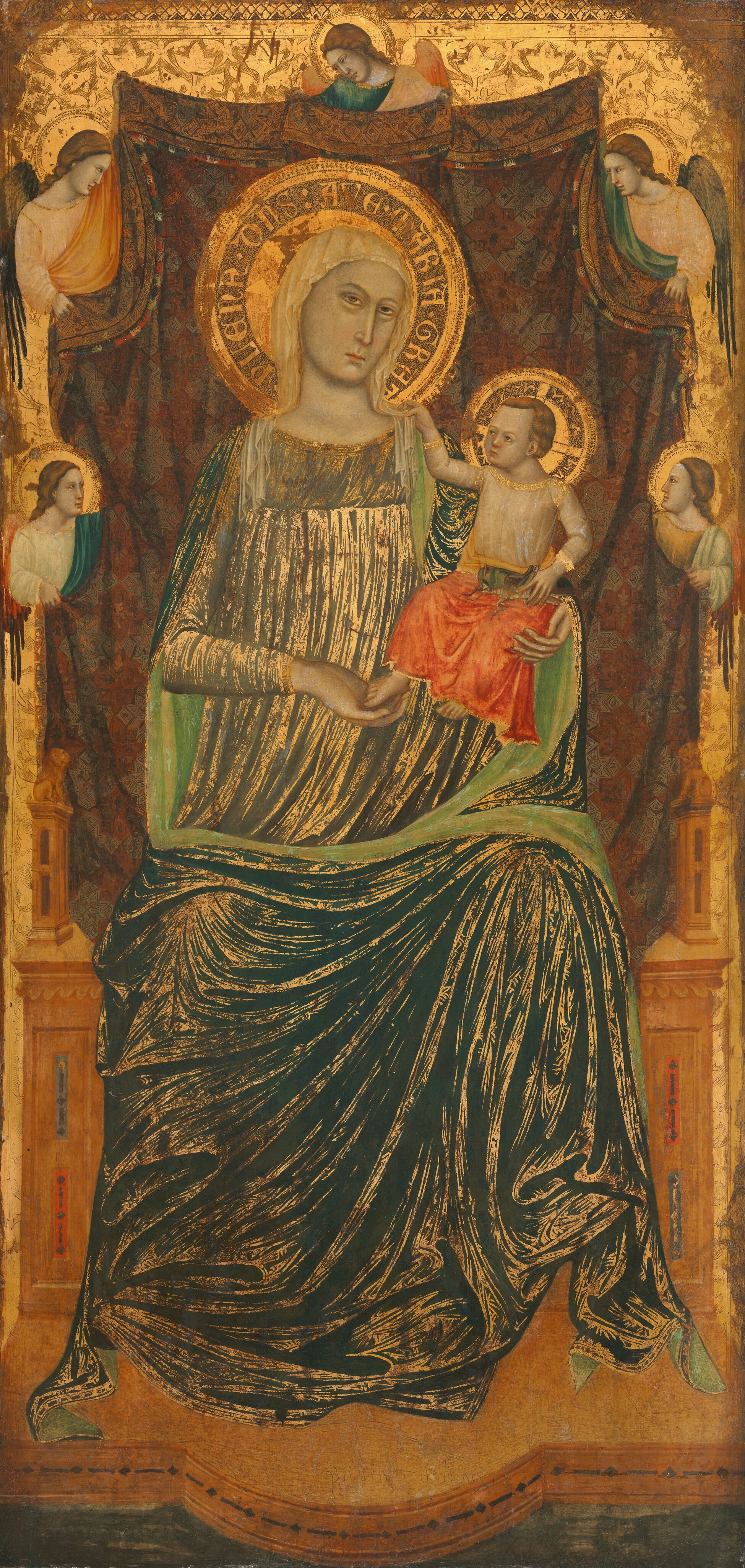 A woman holding a baby sits on a throne in front of a cloth held up by five winged angels in this vertical painting. The woman, baby, and angels all have pale skin tinged with gray, long, straight noses, narrow mouths, almond-shaped eyes, and gold halos. The woman sits with her knees and shoulders squared to us. She looks at us with light brown eyes, and her head tips slightly to the right, toward the baby. A white veil drapes over her head and shoulders, and she wears a slate-blue dress under a teal-green robe, which is lined with pale, spring green. Gold lines densely spaced across the dress and robe suggest folds and wrinkles. She supports the baby’s bottom with her left hand, to our right. He sits upright with his knees and body angled to our left. He reaches up with his right hand, to our left, to touch the woman’s veil, and the other hand rests on an oversized cricket in his lap. He wears a transparent white garment edged with gold and a marigold yellow and coral orange cloth wrapped across his lap over bare feet. His features are small in a round face. He has brown hair, and his hairline is high. The cloth behind the pair is patterned with gray, brick red, and gold. Two angels hold up each long side and one holds up the top. The angels all look in or down. They have brown hair, and wings and robes in shades of golden yellow, pale peach, and celestial blue. The throne has a blocky seat, and the base projects in a semicircle against the navy-blue floor. There are lion finials at the front of each arm. The background is gilded with a leafy pattern in gleaming gold. The upper corners and some areas along the edges are damaged.