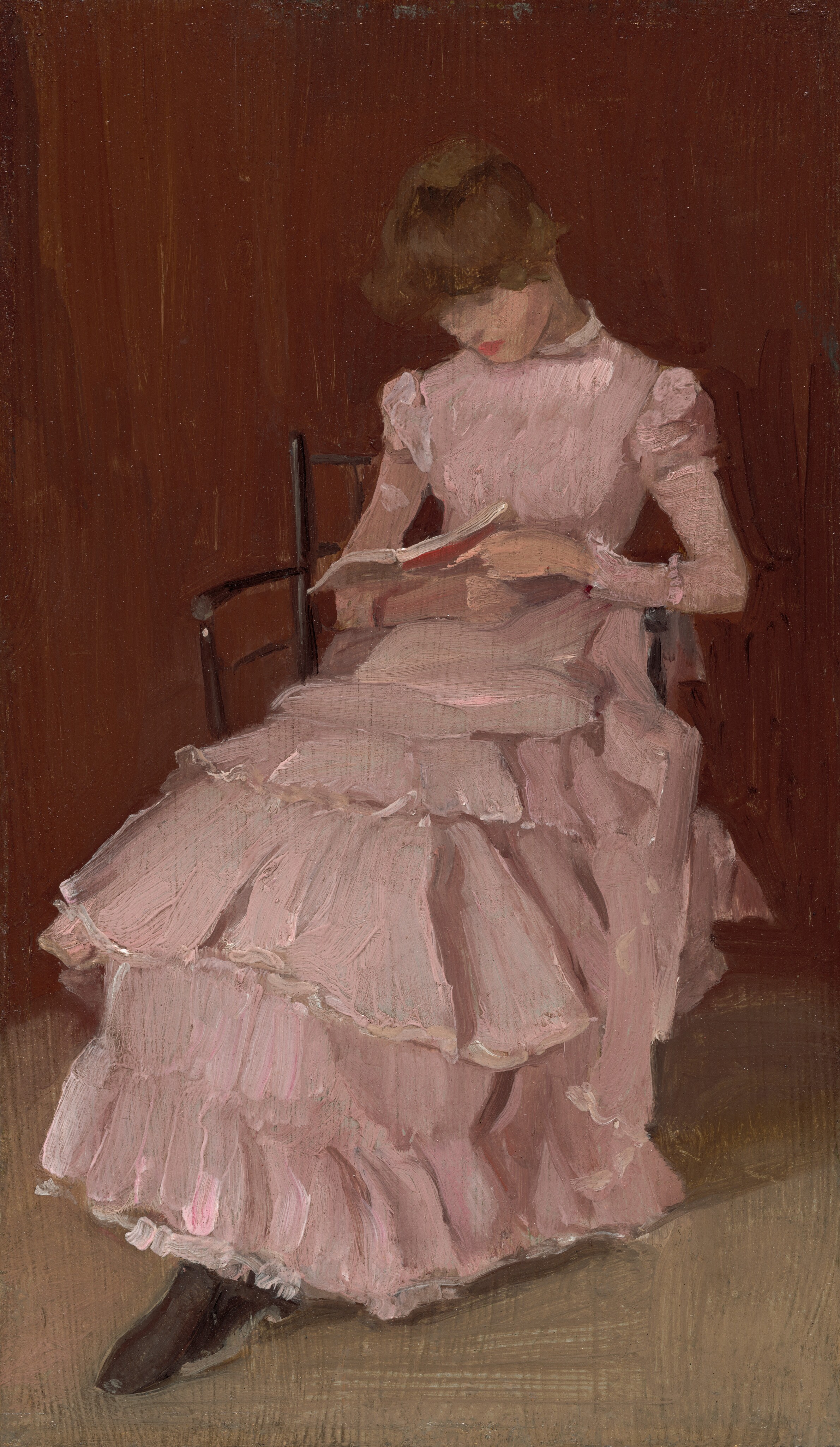 This painting shows a woman seated on a chair, looking down at a book she holds. She has light skin, short, wavy brown hair, and bright pink lips. She is turned slightly to the right, and most of her features are unclear. She wears an ornate pink dress with ruffles down the skirt, a high collar, and slightly puffed sleeves. The wall behind her is a reddish-brown color, while the ground is light gray. The brushstrokes in the painting are thick and visible.