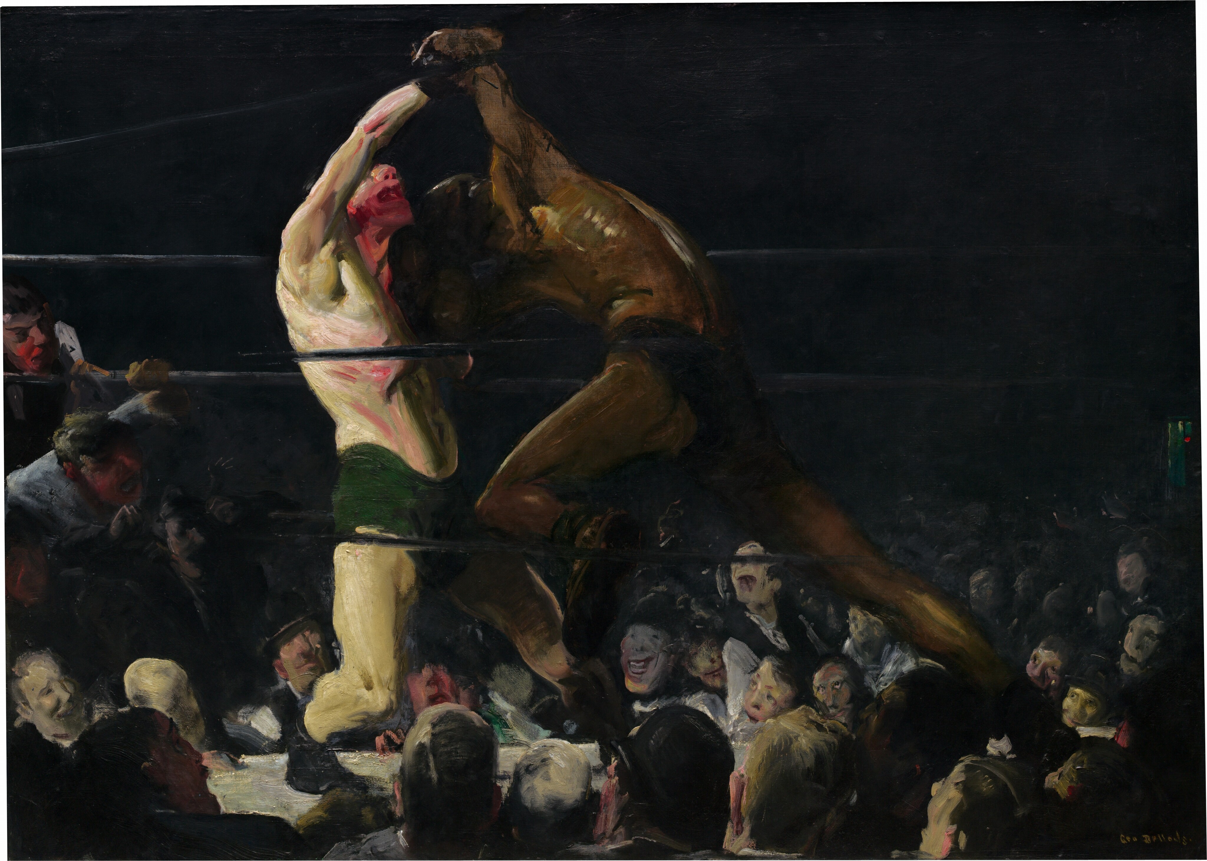 From a darkened arena around a boxing ring, we look up at two bare chested men, one with pale, white skin and the other with brown skin, who lock arms in a boxing match in this horizontal painting. The brushstrokes are loose and visible throughout, making some details difficult to make out. The boxer to our left wears drooping, forest-green trunks and black shoes. He leans back on his bent right leg, closer to us, and tilts his face up. His mouth gapes open and his nose, chin, and neck are smeared with scarlet red, suggesting blood. His pale skin has a green cast, and his chest, arms, and legs are sinewy and muscular. His right arm is raised or pulled up overhead by the boxer to our right. Wearing dark briefs, the second boxer hunches over with head lowered toward the other man’s shoulder. He surges forward onto his deeply bent left knee, closer to us, pushing powerfully off his back leg. His face is lost in shadow and his body has less detail than his opponent, though light glints off his arching back to create gold highlights against his brown skin along his spine, ribs, and muscles of the shoulder. The men’s bodies nearly span the height of the canvas. The black ropes of the boxing ring pass in front of and behind the boxers, and the space around the ring in the top half of the painting is nearly black. Heads and faces of the spectators in the first few rows are lit by the main event and are crowded into the bottom third of the painting. Two spectators on our far left have climbed up and lean on and through the ropes, their mouths open. The crowd, which appears to be all light-skinned men and boys, are painted loosely but their mouths widen in toothy grins or are agape. The artist signed the work in yellow letters against black in the lower right corner: “Geo Bellows.”