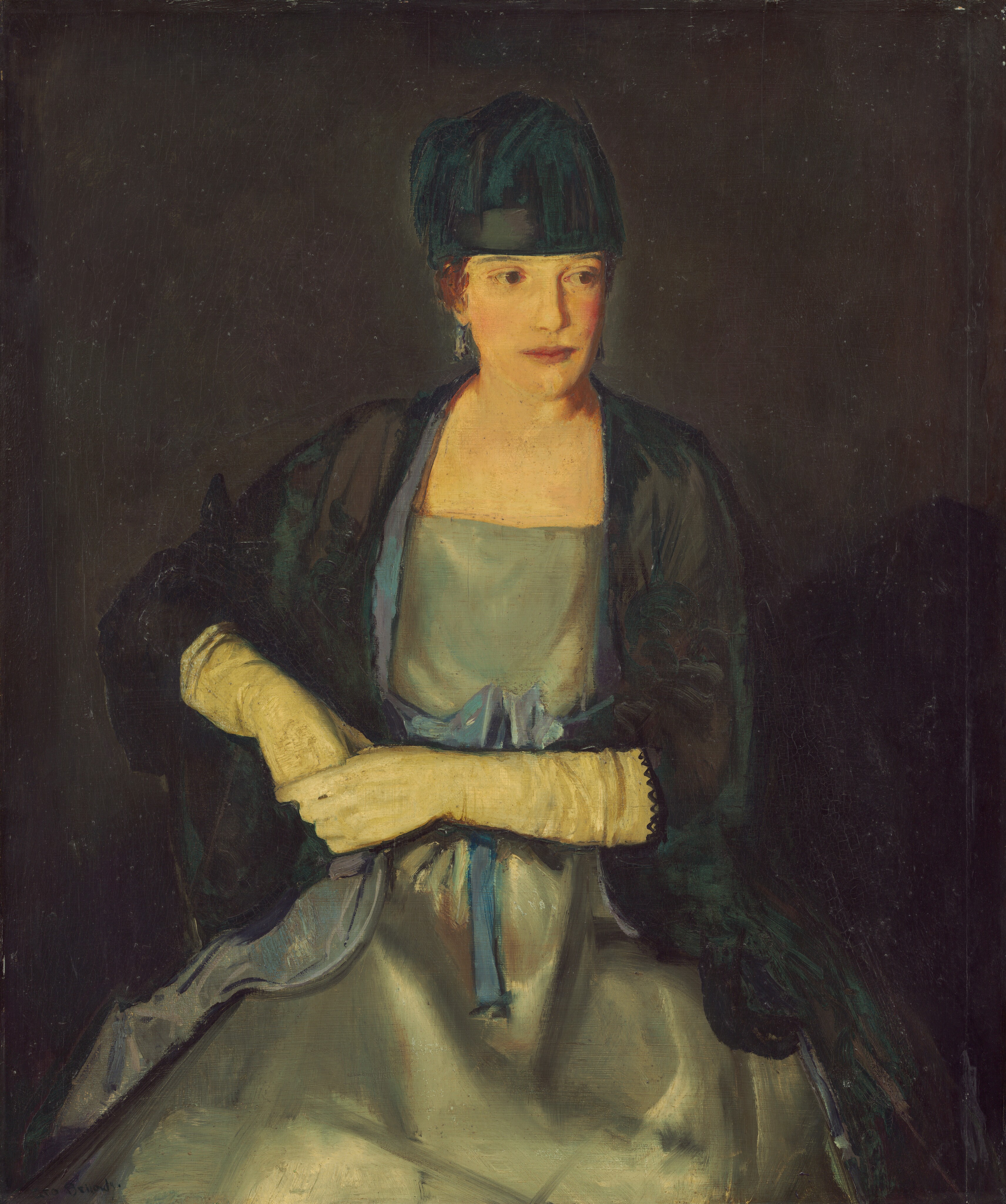 This painting shows a seated woman from the waist up. Her body faces us, and she looks off to the right with a neutral expression. She has light skin, brown eyes, and rosy cheeks. Her reddish-brown hair is concealed under a dark blue hat or cap, and a blue earring dangles from her ear. She wears a dark blue shawl or jacket over a light, pastel-blue dress cinched at the waist with a royal blue ribbon. Her hands are clasped in front of her waist and covered with long white gloves. The background is dark gray.