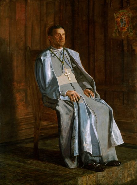 This painting shows a man seated in a wooden chair, facing slightly to the right with his hands resting on his lap. He has pale, wrinkled skin, a large nose, prominent cheekbones, a thin, closed mouth, and short dark hair. He wears a light blue clerical robe with a large cross around his neck. His shoes are dark with silver buckles, and he has a large ring on one finger. There is patterned fabric on the floor beneath his chair, which appears to rest on a low platform. The background has dark wood paneling, and a coat of arms is on the wall to the right.