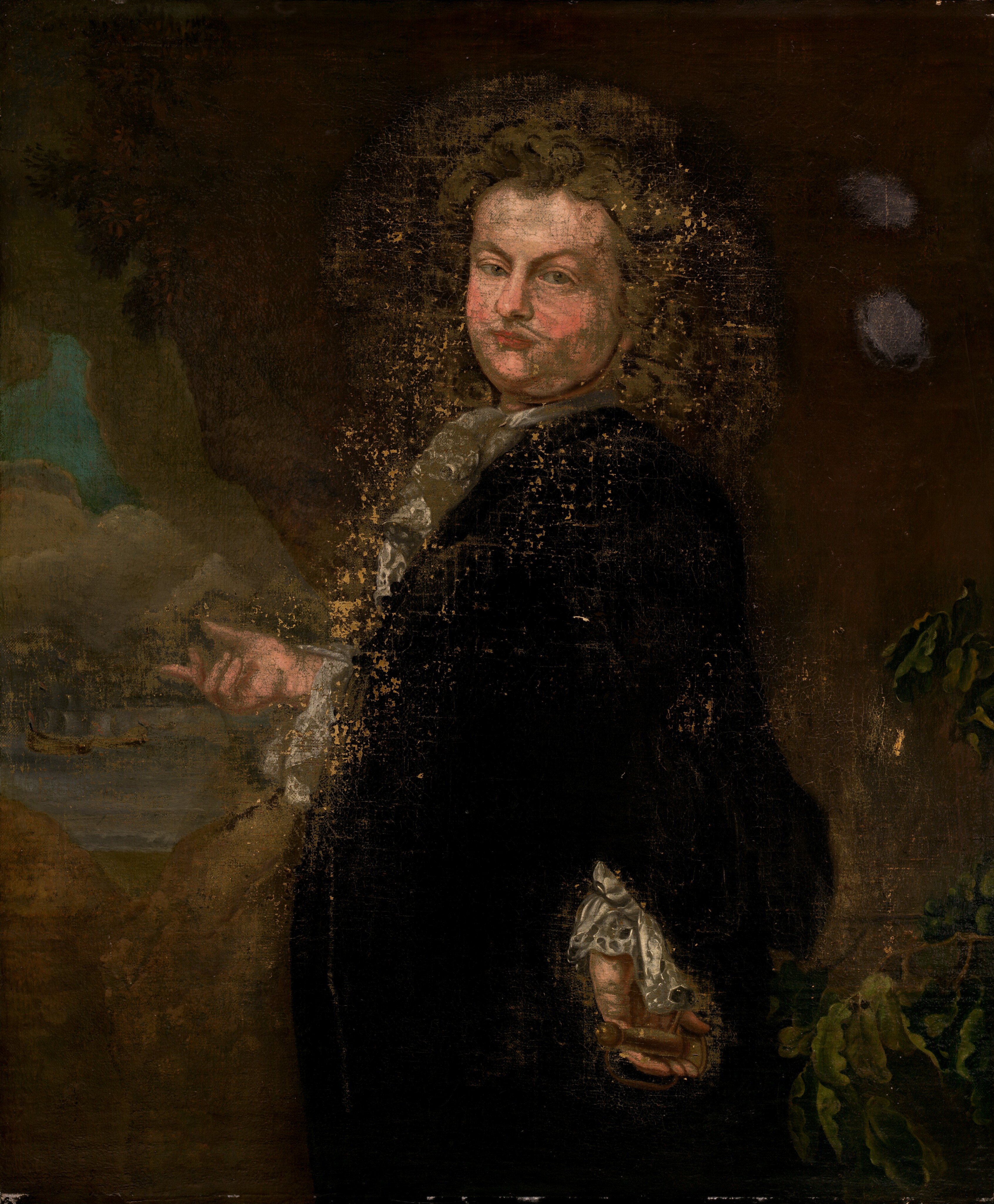 The image shows a portrait of a person facing the viewer with their body slightly turned. The individual has curly, shoulder-length hair and distinct facial features including a prominent nose, slightly pursed lips, and a straight gaze. They are wearing a dark garment with white lace at the collar and cuffs. The person is holding an object in their left hand, partially obscured. The background features darker shades, possibly foliage or textured surfaces, with greenery on the right side and a hint of sky or clouds on the left. The painting shows signs of aging like fading and cracking of the paint.
