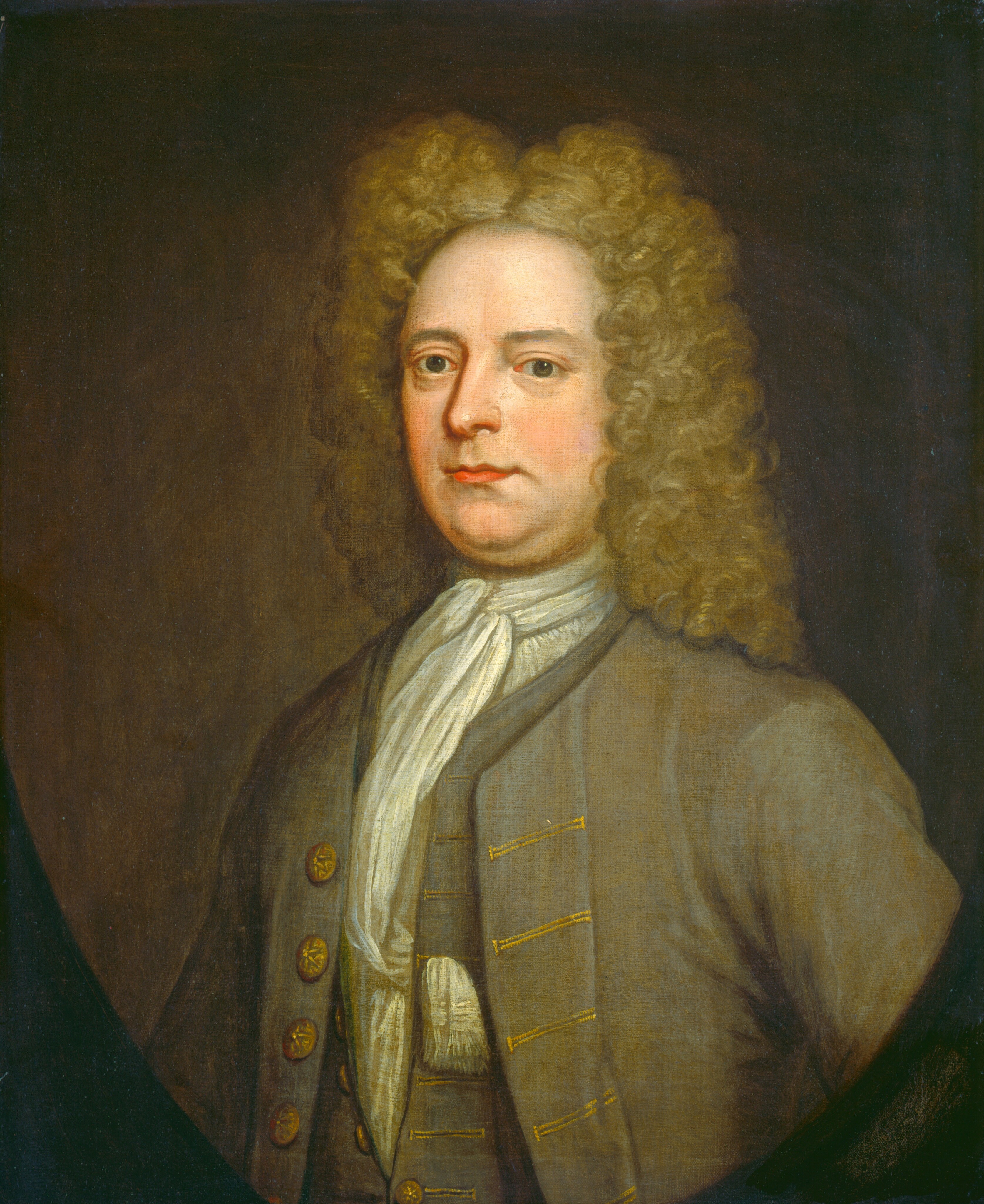 The image shows the upper body of a man facing the viewer directly with a slight turn to his left. He has a serious expression with distinct facial features, fair complexion, round cheeks, and voluminous, tight curls framing his face. He is dressed in a historical coat with gold buttons and trim, a white high-collared shirt, and a cravat. The background is a muted, dark brown tone.
