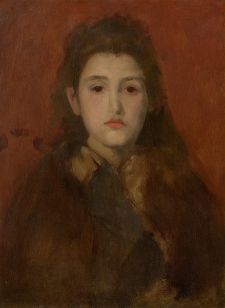 The head and shoulders of a young woman with gold-tinted, pale skin looks out over our right shoulder from against a tomato-red background in this vertical painting. The portrait is created with mostly visible, sinuous brushstrokes that make some details indistinct. With her body facing us, the woman nearly fills this composition. She looks in our direction with large, dark eyes under almost flat brows. She has an oval face, a long nose, and her full, slightly downturned coral-red lips are closed. Her chestnut-brown hair falls loosely down her back. Some locks pour over her left shoulder, to our right, and her hair is tucked behind her other ear. Her hair and clothing are especially loosely painted, so it is difficult to make out what she wears. An area of beige could be a scarf draped around her neck and down her front, or a dark, coffee-brown cloak could be open over a lighter garment beneath. The red background is painted with long, visible brushstrokes, and three dark brown spots are clustered against the background over her right shoulder, to our left.