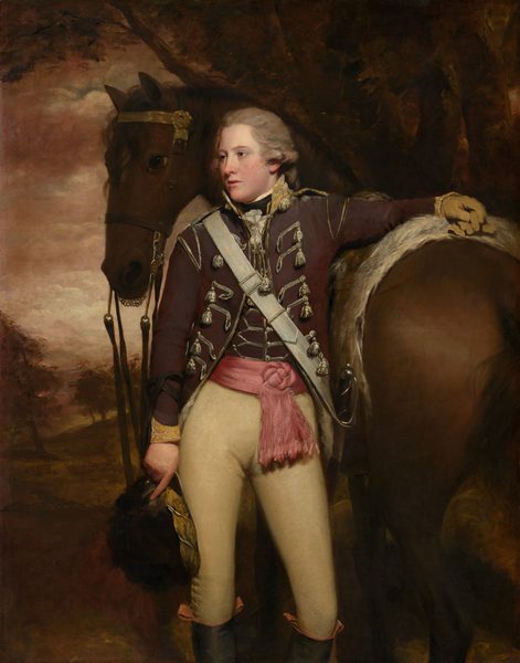 This painting is a portrait of a man standing upright, his chest facing us and his head turned to the left. A horse is positioned directly behind him, and his left arm is lifted, resting on the horse's back. The man has fair skin and wavy gray hair that curls around his ears and seems to be tied behind his neck. He has a slightly flushed complexion, a long nose, pale eyebrows, and lips that seem to be partially open. He wears a formal military uniform, including a brown coat adorned with silver braiding, a brown vest, a pink sash tied at his waist, tan trousers, and tall black boots. He holds a black hat in his right hand. The horse is brown, with its rear visible on the right and its head on the left. The background shows a wooded landscape with dark brown trees and a cloudy red sky.