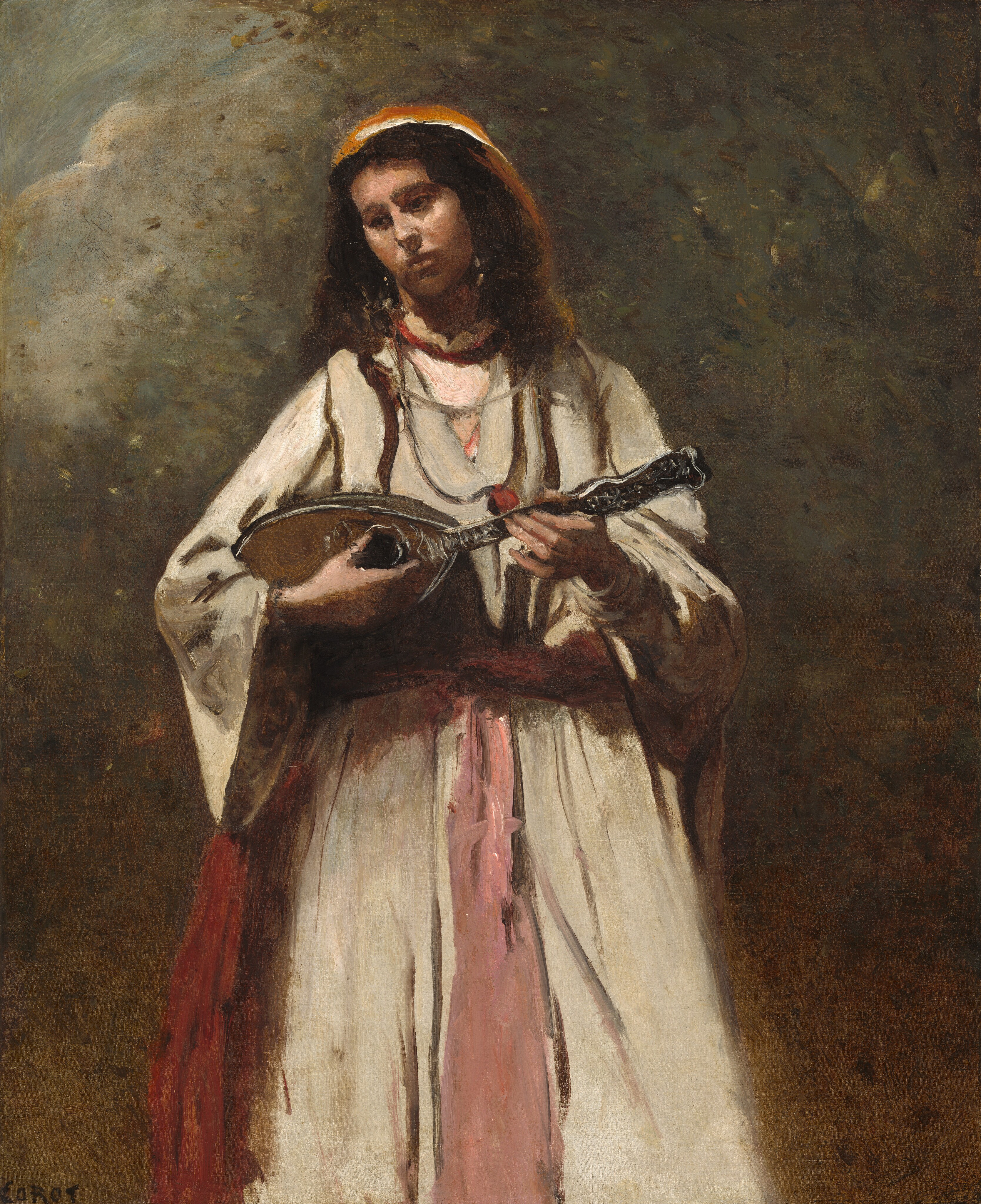 Shown from the shins up, a woman with medium-toned skin plays a mandolin in this loosely painted vertical composition. The woman’s body faces us but her head tips to our left and she looks down in that direction with dark eyes. She has a short nose, and her full lips are closed over a rounded chin. Her brown hair falls loosely around her shoulders and is covered by a pumpkin-orange head cloth. Glints at her ears suggest earrings. She wears a beige jacket with puffy, voluminous sleeves over a shell-pink shirt with a high, ruffled collar above a red band. A rose-pink sash is tied around her waist and falls down the front of her long, beige skirt, and red cloth hangs along her right side, to our left. She holds a mandolin in both hands. The background is painted with dabs and mottled tones of earth green, golden brown, and muted blue and white for the sky. Brushstrokes are visible or blended throughout and are especially broad in the clothing and background. The artist signed the lower left corner, “COROT.”