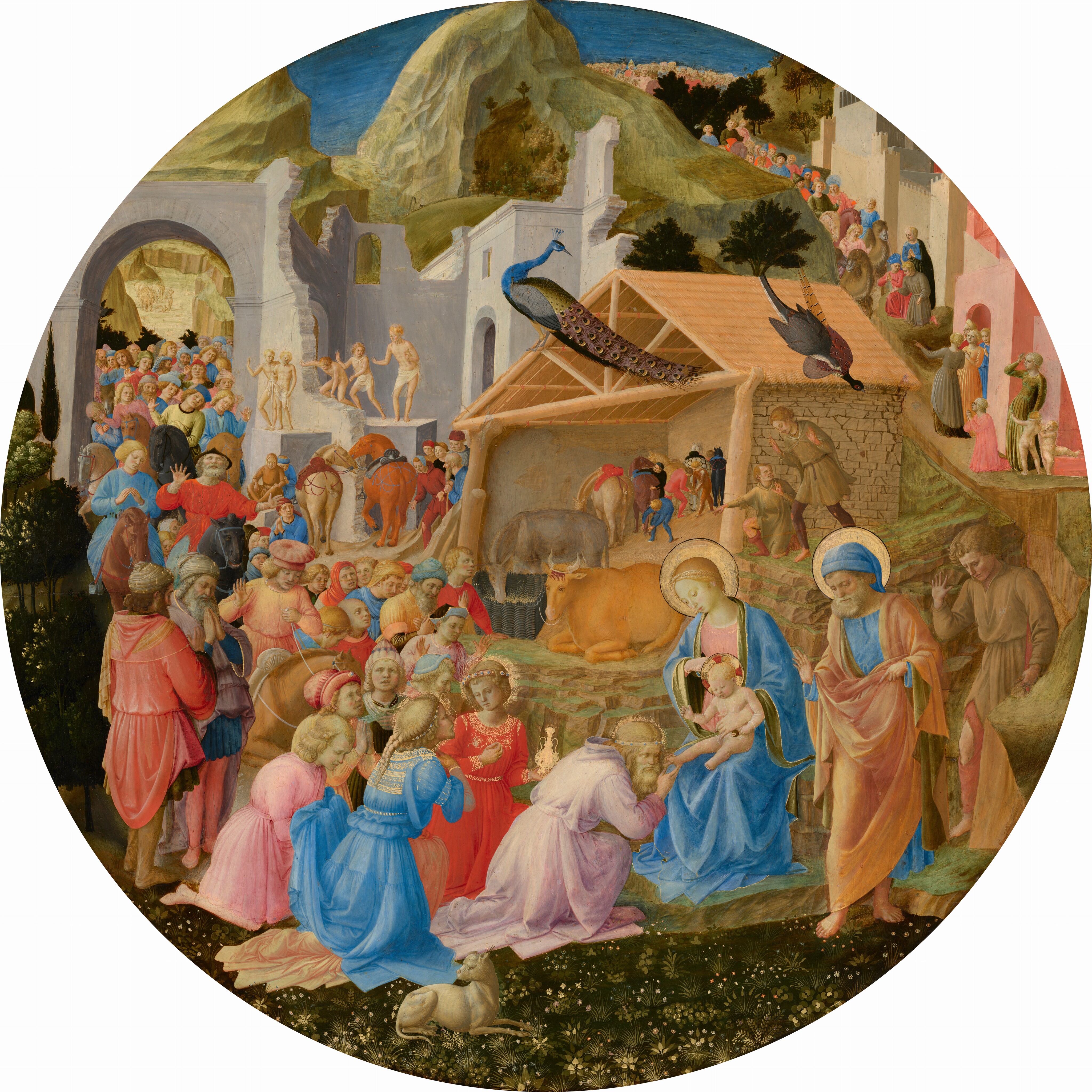 Dozens of people line up around a shed-like structure and around stone ruins to kneel before a woman and baby at the lower center of this circular painting. All the people have pale skin. The crowd gathers along a pathway that winds around a rocky mountain at the top middle of the composition. Most of the people are on foot but a few ride horses or camels. The line of people curves around and through an arched opening in a stone ruin to our left. Sitting at the center of the painting, behind the woman and baby, Mary and Jesus, the structure is open at the front and has a triangular pitched roof. Some of the people, including the three closest to Mary and Jesus, wear elegant, gold-trimmed clothing. Others wear simple tunics, and several people standing along the ruins in the middle distance wear only white loincloths. Ages of the people range from young and cleanshaven to older and bearded. Their costumes are mostly pale yellow, coral orange, crimson red, shell pink, or sky blue. Some people raise their heads and hands while others hold hands to their chests and close their eyes. Mary wears a pale blue robe over a blush-pink dress. Jesus is nude and an older man standing nearby wears an apricot-colored robe over a blue tunic. The older man, Mary, and Jesus have gold halos. A peacock and two other birds stand on the roof of the manger, which shelters an ox, ass, and horses.