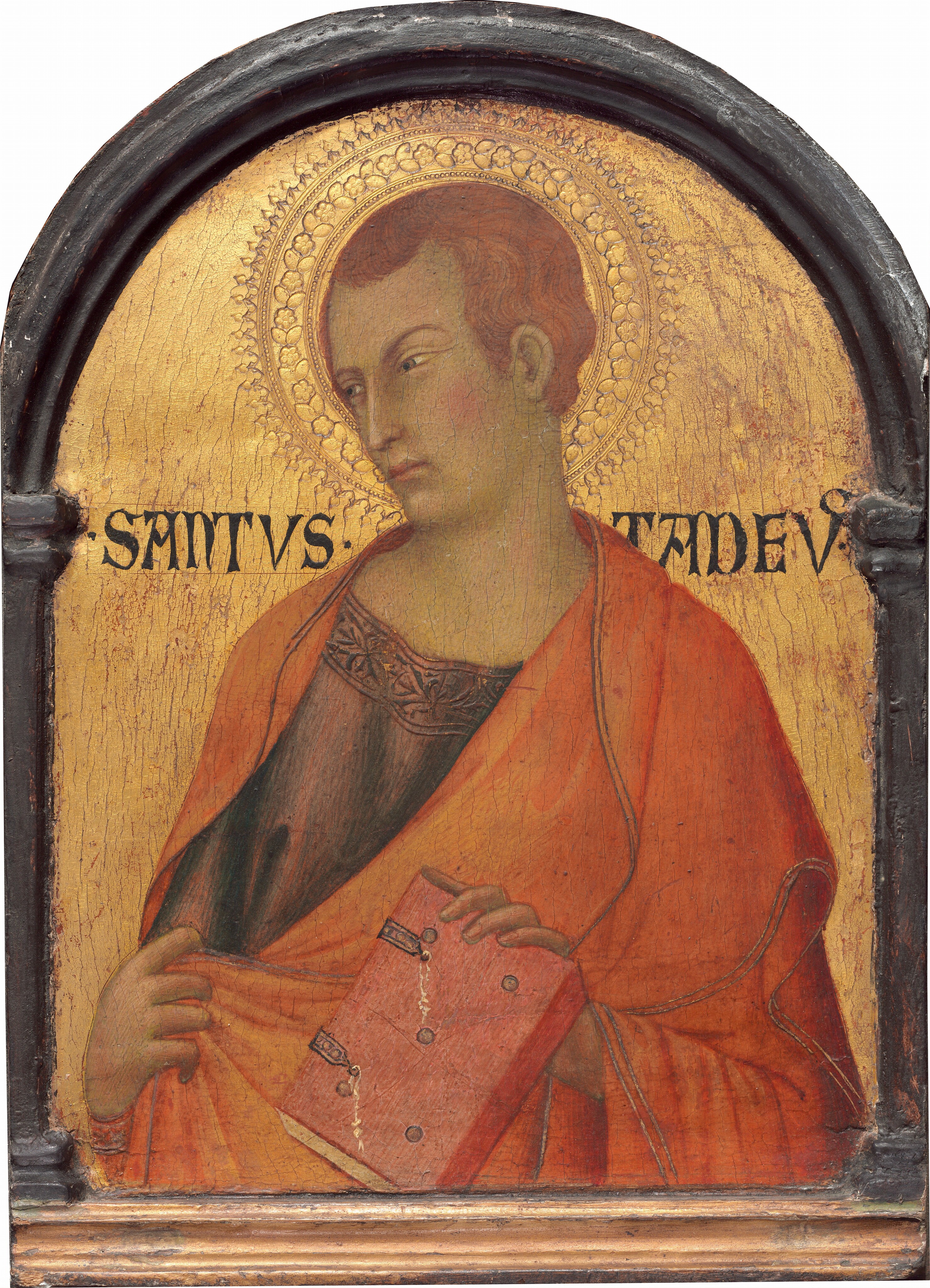 This painting shows the upper body of a man with his body turned to us and his head looking to the left. The man has short, reddish-brown hair, light skin, rosy cheeks, arched eyebrows, and a small mouth in a neutral expression. He is wearing a dark purple garment with some designs around the neckline under a bright orange robe that is draped over his shoulders. He holds the edge of the robe in his right hand and is holding a red book in his left hand. A golden halo surrounds his head. The background is textured gold, and the painting is framed in a black arched frame.