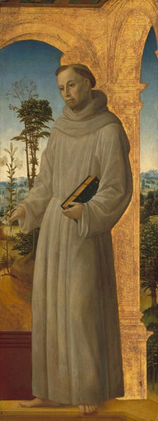 The image shows a man standing upright. He has short hair with a shaved top, wearing a brown robe tied at the waist. In his hands, he holds a small branch with white flowers and a closed book. The background includes trees, hills, and a blue sky. A golden decorative structure frames the scene.