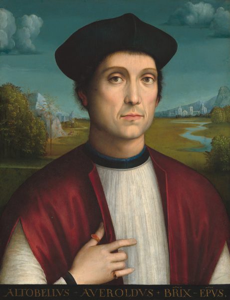 This painting depicts the upper body of a man with a fair complexion, short dark hair, a long nose, thin eyebrows, deep-set brown eyes, and thin pink lips in a neutral expression. He is facing us, wearing a black cap, a deep red cloak, and a white inner garment with a high black collar and long white sleeves. His right hand is raised to his chest, and it has two small rings on it. In the background, there is a landscape with bright green fields, green trees, and a winding blue river on the right. In the background there are distant blue hills, and some light blue structures resembling buildings or castles under a blue sky with clouds. At the bottom of the painting is a line of gold text on a black border.
