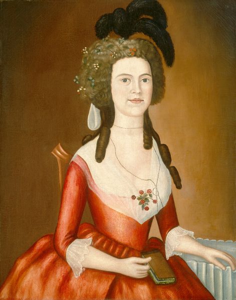 The image depicts a woman from the waist up, seated and facing forward. She has fair skin, distinct facial features, and elaborately-styled, powdered hair with flowers and black plumes. She wears a red gown with lace, a white lace collar, pearls, and a corsage. She holds a book and the background is a plain, warm brown color.