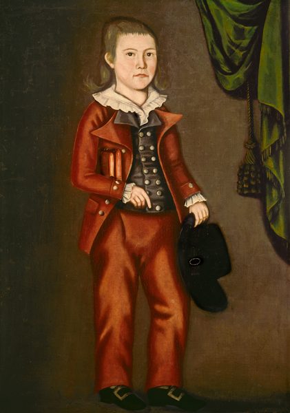 The image shows a full-body portrait of a young person with fair skin, wide eyes, and straight hair falling past the shoulders. They are wearing a formal outfit consisting of a red coat over a dark waistcoat with rounded buttons, white cuffs, and a white collar. The person holds a hat in their left hand and a stack of red books under their left arm, with their right arm resting against their side. In the background, there is a plain, muted color with a green drape with tassels visible to the right of the subject.
