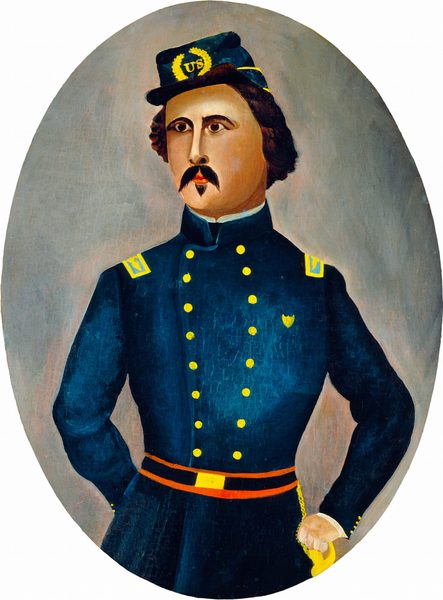 The image depicts a half-length portrait of a person shown from the waist up. The individual is standing with a confident posture, one hand positioned at their waist. Their facial features include a prominent mustache and pointed beard, with slightly arched eyebrows and a direct gaze. The person's hair is a dark shade, styled close to the head and visible beneath their hat. They are wearing a dark blue military uniform adorned with yellow buttons and shoulder insignia, along with a yellow and red belt. The hat is also dark blue with a yellow emblem that has the letters "US," circled by a decorative design. The person also wears yellow gloves on their hand. The background of the image is a muted, textured surface in shades of gray.