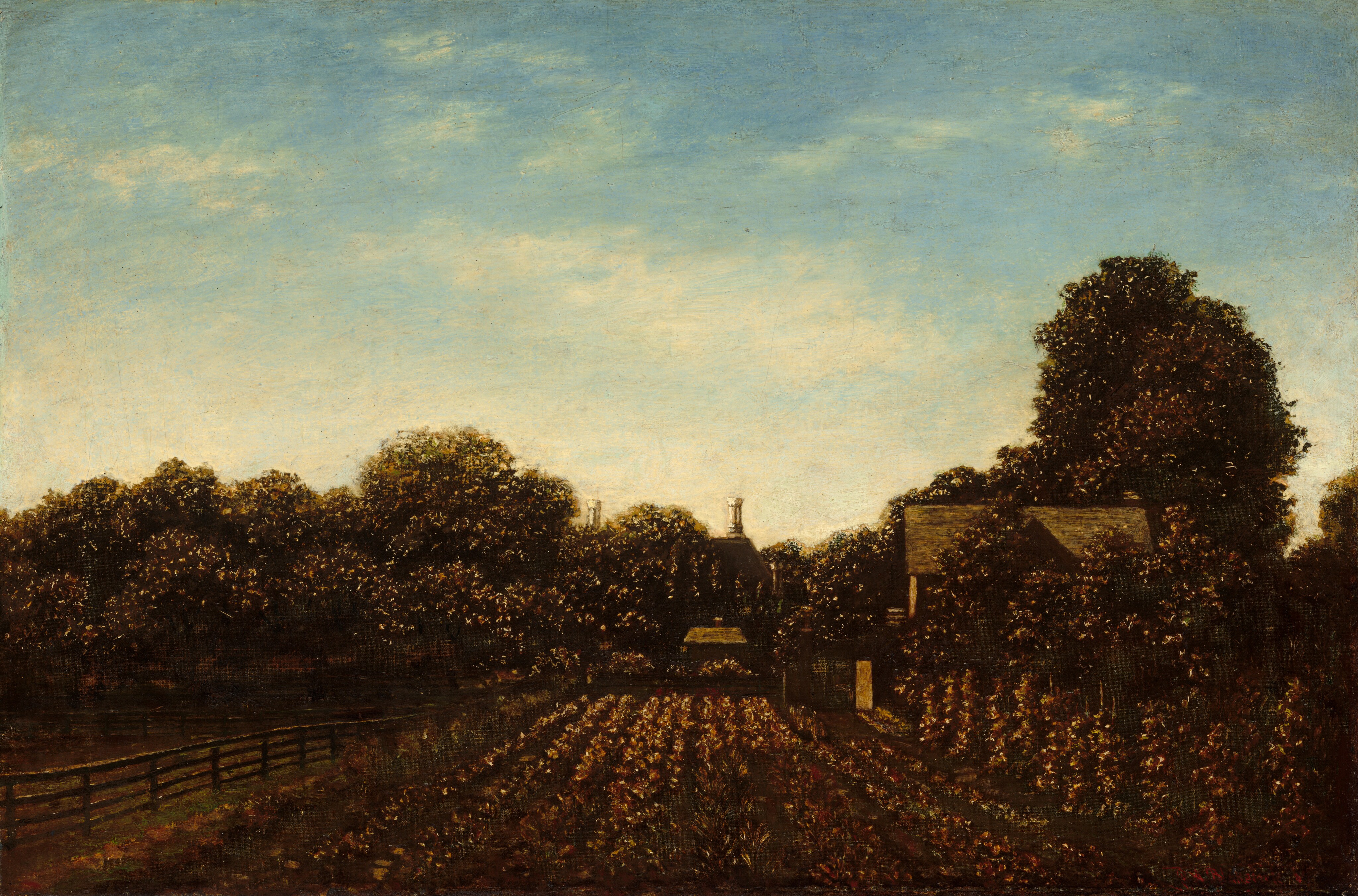 Neat, tended garden rows stretch away from us toward a band of trees in this horizontal landscape painting. Low plants grow across the middle of the scene, and higher plants are staked on poles to the right. A fence runs alongside the garden to the left, and a few structures are tucked among the trees’ bushy canopies. Two white chimneys are outlined against the watery blue sky on the far side of the tree line. The plants are painted with visible dabs of copper brown and ivory white, and the dark trees are highlighted with more white glints. The entire scene is backlit and shadowy, though, making details about the buildings, which might include a shed, gate, and house, hard to make out. Thin white clouds skim across the sky. Traces of a signature in red paint are visible in the lower right corner.