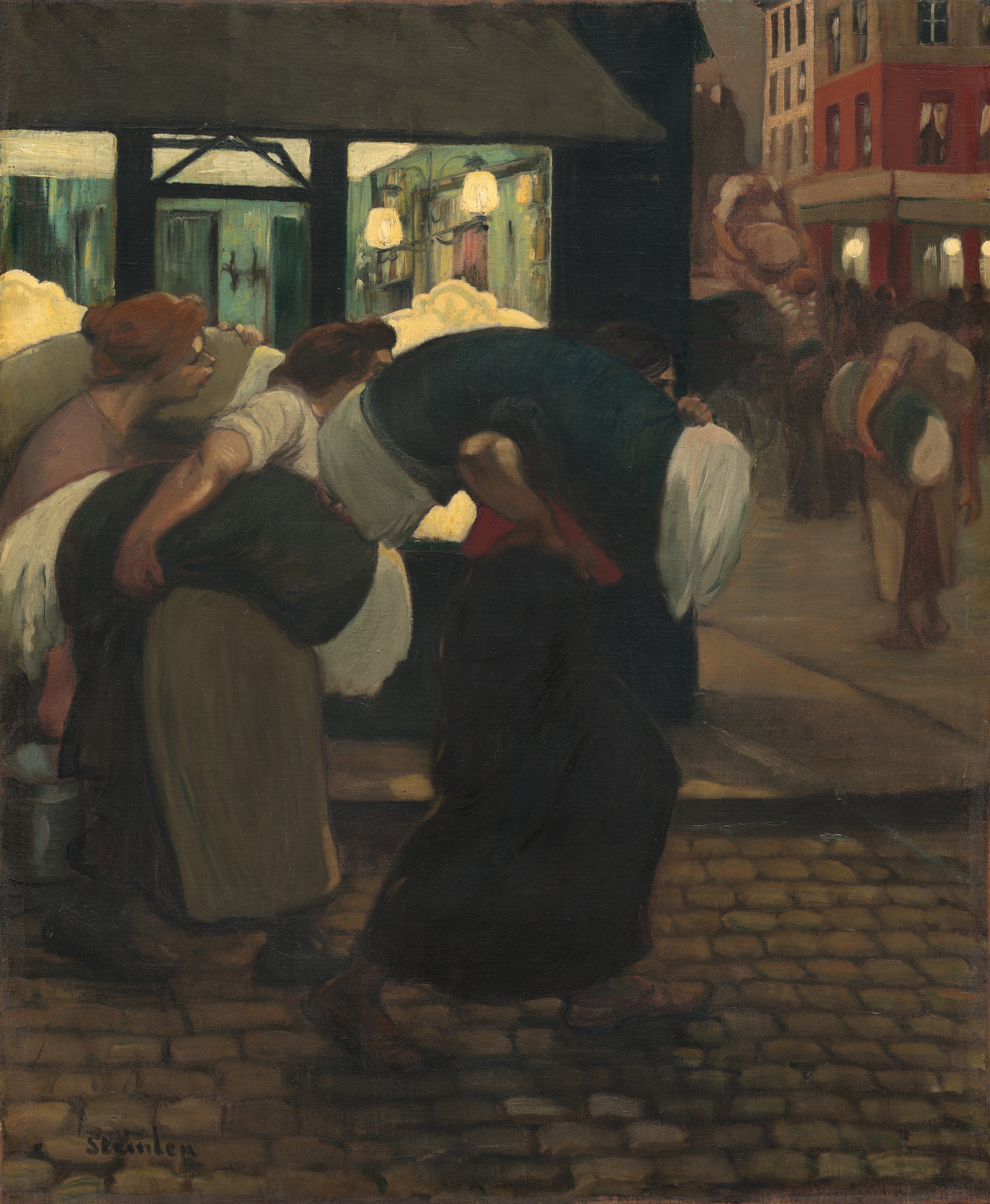 This is a painting of a dim street with several people carrying sacks. The people wear long skirts and aprons in dark colors, and their large sacks are filled with white cloth. The people are bent over under the weight of the sacks. They walk across a cobblestone street in front of a building with a lit interior and blue wallpaper. On the right side of the painting is another street with more buildings and a carriage where people appear to pass up their sacks to a person on top.
