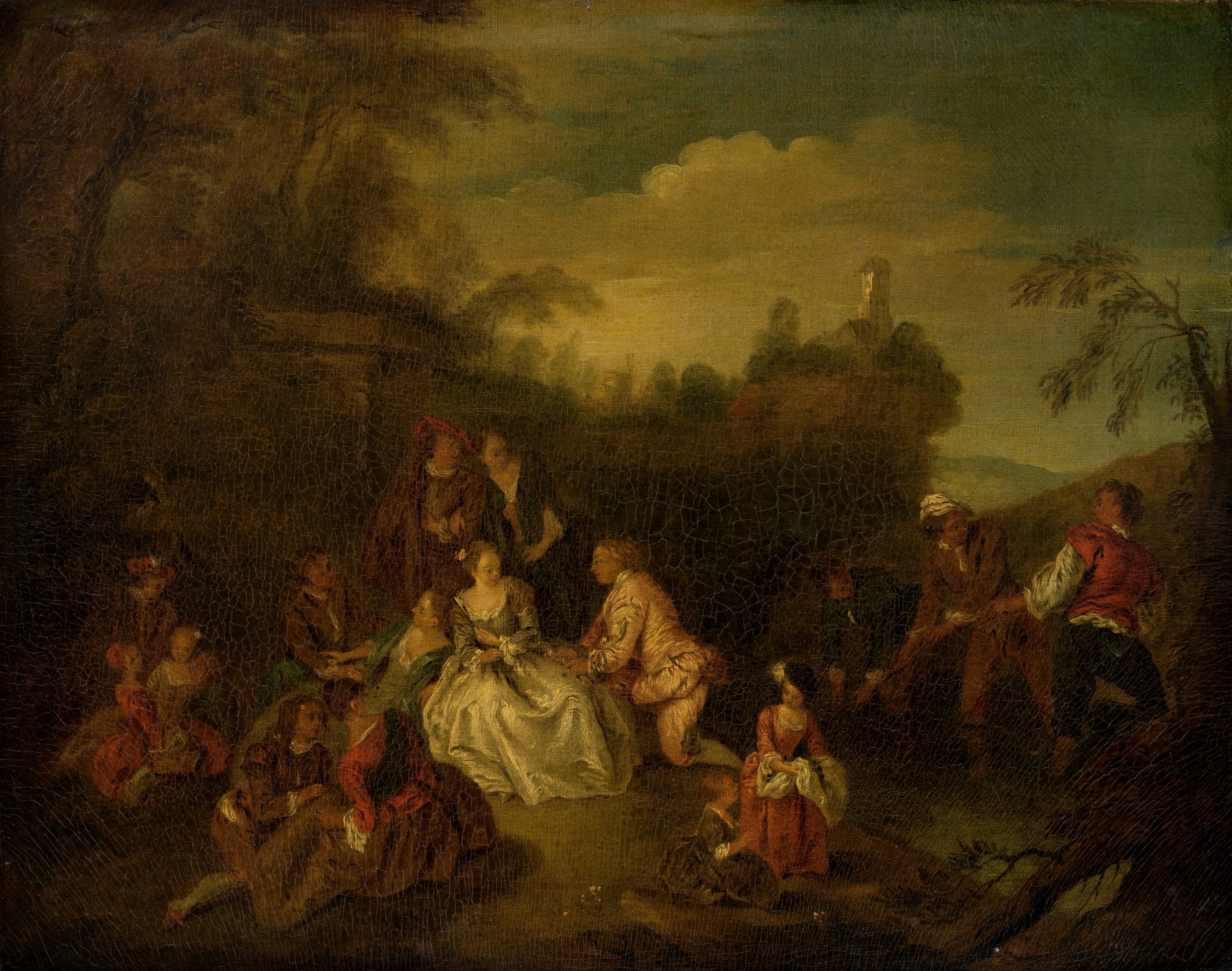 This painting depicts a gathering of people in a landscape setting. In the center, a woman in a pale gray dress is sitting, looking at a man in a pale pink suit who is kneeling next to her on the right. More men and women wearing elaborate dresses and suits are gathered on the ground around them, many of them disappearing into shadow on the left. On the right, there are two young girls, one appearing to have objects gathered in her white apron. Behind them, three men with their legs partially submerged in water appear to be pulling something upward by a rope. The people have skin in shades of cream, tan, and light brown. The scenery is dark, mostly painted with shades of brown and dark olive green. The horizon is in the upper third of the composition, showing trees and a tower on a brown cliff in front of a blue-green sky with light gray clouds.