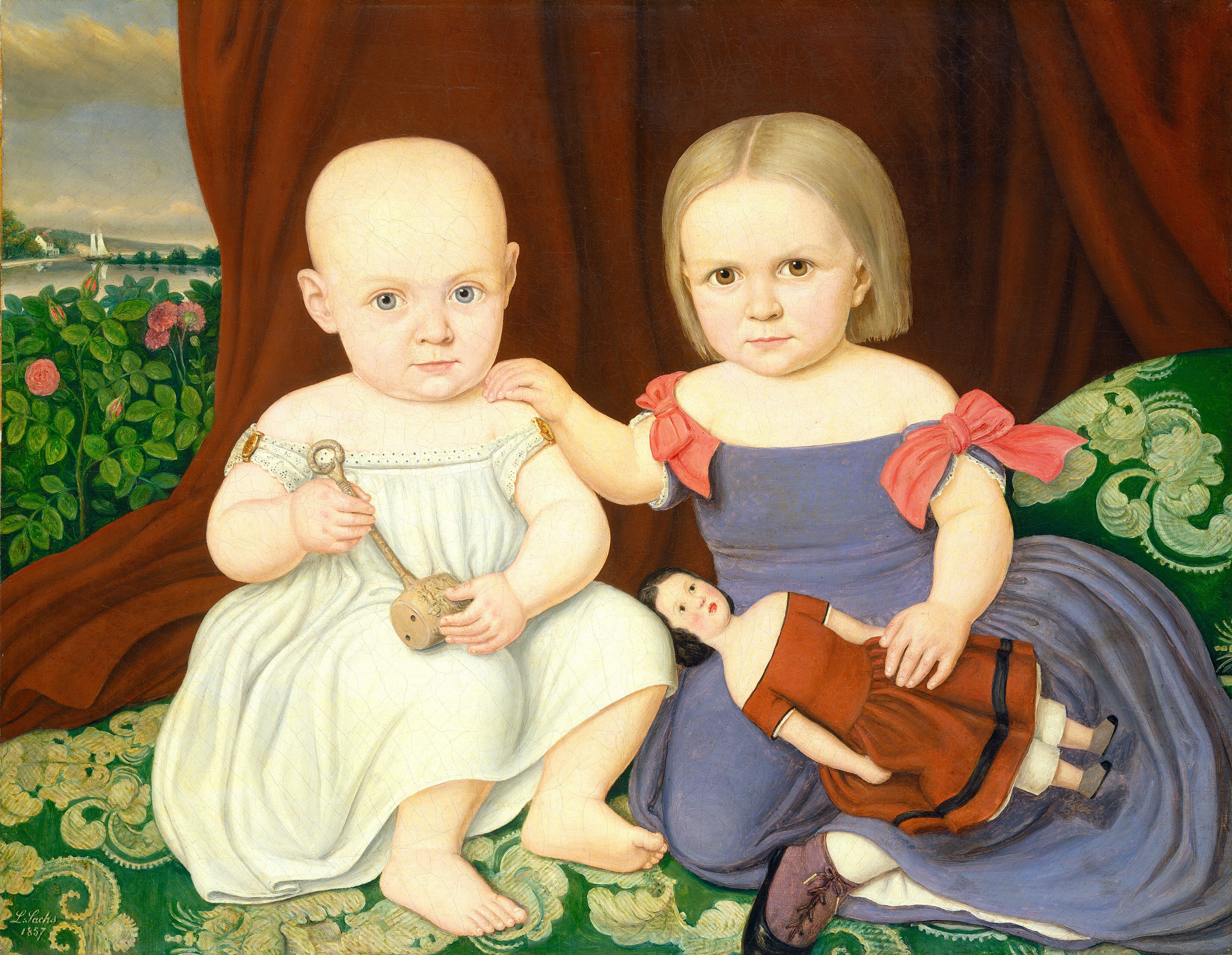 The image depicts two young children seated next to each other. The child on the left is seated on the floor, holding a rattle. They have a round bald head, light eyes, and wear an off-white dress. The child on the right is holding a doll, has light blonde hair, and wears a purple dress. They are surrounded by a green carpet and a brown curtain. In the background, there is greenery, pink flowers, a sailboat on water under a blue sky with clouds.