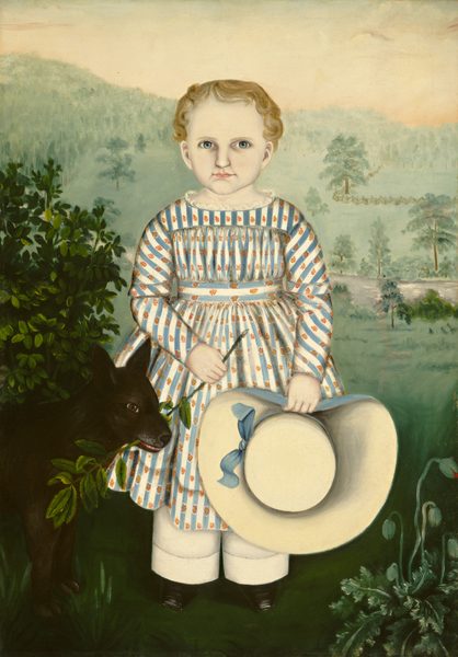 The image shows a child standing with both hands in front. The child has a full face, large, round eyes, and fair, short, curly hair. They are wearing a dress with blue and orange stripes and small floral patterns, white pants, and black shoes. The child holds a thin stick in one hand and a wide-brimmed straw hat with a blue bow in the other. A small black dog stands at the child's left side, appearing to sniff a leafy branch. The background features soft green hills, scattered trees, and a light sky.
