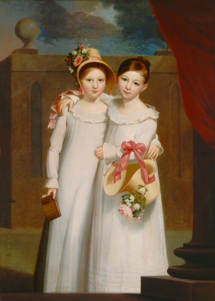 Two young, pale-skinned girls wearing white stand side-by-side on a stone terrace in this vertical portrait painting. Each girl wears a long-sleeved, floor-length white dress with a ruffled collar and cuffs. The girl on the left wears a bonnet decorated with white, pink, and red flowers. Carnation-pink ribbons wrap around the crown and ripple off each side, presumably to be tied under the chin. She holds a tawny-brown book about the size of a postcard down in her right hand, to our left. She wraps her other arm around the waist of the second girl, who drapes one arm across the first girl’s shoulders. This second girl’s other arm rests across her middle, and the ribbons of her bonnet, which is identical to the first, are tied in a bow and hangs from that forearm. Both girls have heart-shaped faces, flushed cheeks, flat noses, wide-set eyes, and pale pink lips, which curve in slight smiles. Both have honey-brown hair combed to one side and pulled back. Behind them, a stone balustrade and pillars enclose the space, and a red curtain is drawn to the right side of the painting. Above the wall, dark clouds crowd the evening sky. The ground or terrace is olive green.