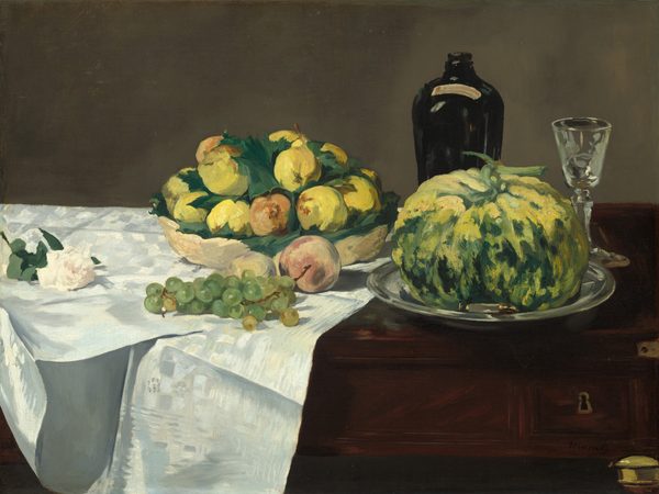 A white rose, grapes and other fruit, a squat gourd, a bottle, and a glass are arranged across a dark wood table partly covered by a white cloth in this horizontal still life painting. The table and its objects fill the width and most of the height of this composition, and are set against a sable-brown background. The rose, bowl, cluster of green grapes, and a peach sit on the shimmering, bright white cloth, which is draped over the left half of the table. The shallow, straw-yellow bowl holds a pile of canary-yellow pears and a few peaches nestled among green leaves. Another peach and a second piece of fruit sit in front of it, partly obscured by the grapes that lie near the front edge of the table. Continuing to the right, the pumpkin-shaped gourd, roughly the size of the bowl and its fruit, is painted with streaks and daubs of lemon yellow and light and forest green. It sits on a gleaming silver tray. A tapered, earth-brown bottle and a small glass with a long stem stand behind the gourd. On the front face of the table, near the lower right corner, a keyhole is outlined with gold, and the top of one table leg is also gold. The objects are loosely painted with some visible brushstrokes, especially in the fruit in the bowl and the gourd. The artist signed the lower right, "Manet."