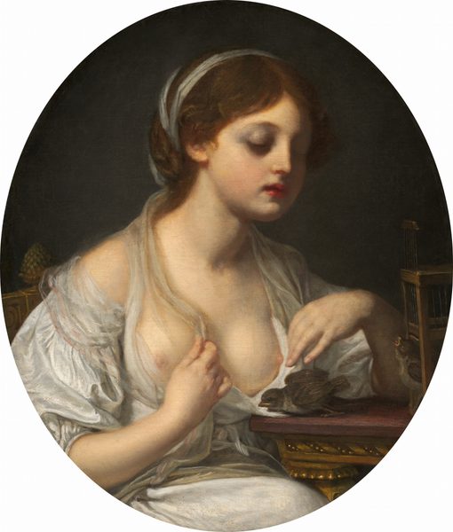 Shown from the waist up, a pale-skinned young girl sits next to a table with two small brown birds in this vertical, oval-shaped portrait. The girl’s body is angled to our right, and she looks down her cheeks at the birds. Her heavy lids are pale purple, and she has a delicate nose, full, red lips, and a round chin. Her brown hair is parted down the middle and pulled back under a white band. Her white gown is loose over her chest, exposing both round breasts and pale nipples. She holds the cloth to each side of her left breast, farther from us. A bird at the edge of the table leans forward toward the girl. The second bird pokes its head out of a box-like cage and looks up, beak open. The table has a mauve-purple top over a carved gold apron and leg. The girl’s chair has a nut-shaped finial on one rail, and the background is dark gray.
