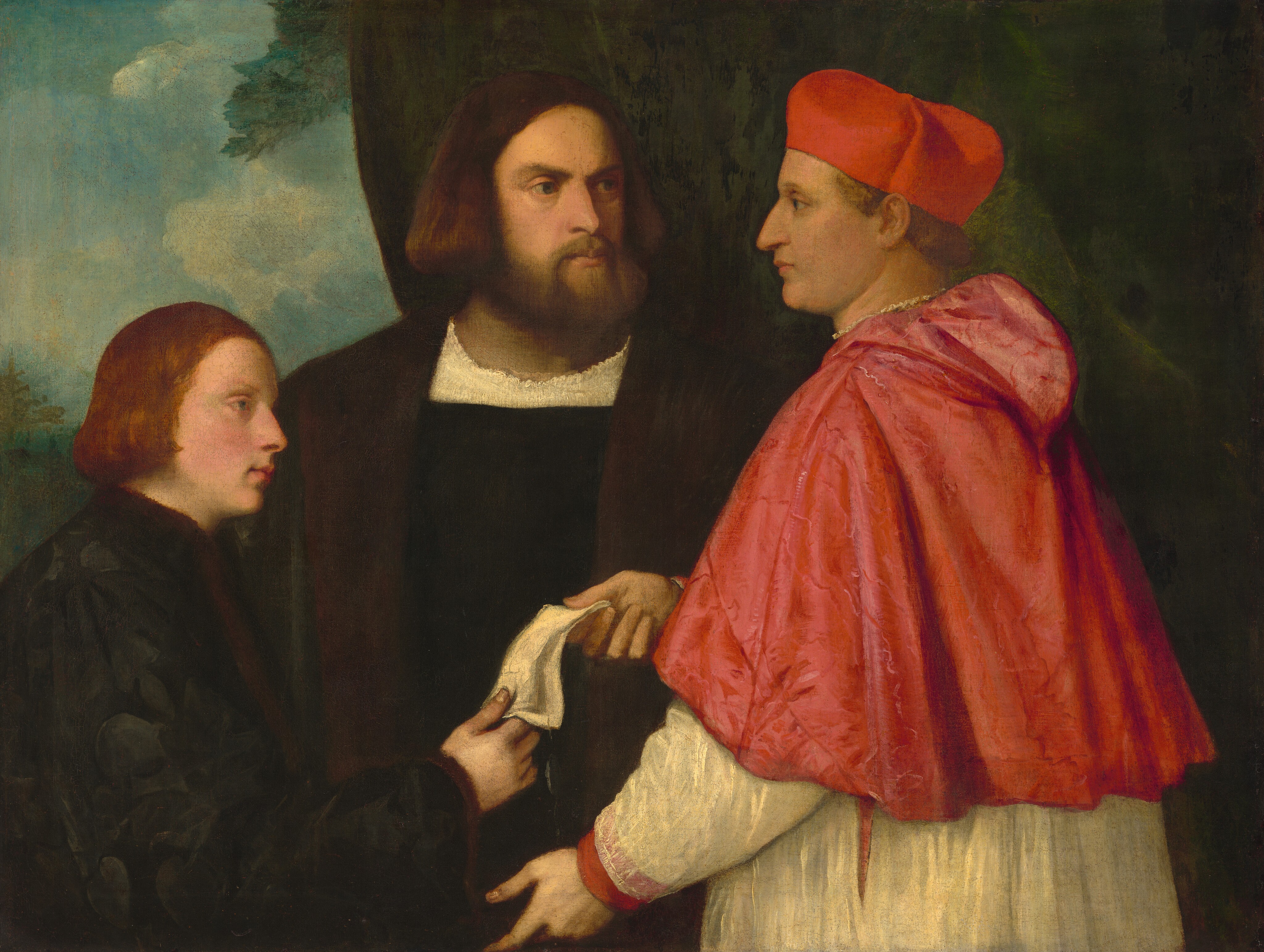 Shown from the hips up, a man hands a piece of paper to a young man as a third, bearded man looks on in this horizontal group portrait painting. All three have pale, peachy skin. To our right, a man wears a red cardinal’s cap, elbow-length red cape, and a white robe over a red garment, which is visible through a slit over one hip and at the cuffs. The cardinal faces our left in profile and looks straight into the distance. His blond hair curls across the nape of his neck under the cap. He has a gently bumped nose, and his thin lips are closed. He hands a folded piece of white paper to the young man to our left, who faces the cardinal, also in profile. The young man has blue eyes, chin-length red hair, pink cheeks, and paler skin than the other two.  He wears a black, long-sleeved jacket with voluminous sleeves. The third man stands between the two and looks at the cardinal with gray eyes under low brows. That man has a pointed nose, slight bags under his eyes, chin-length brown hair, and a trimmed beard. The collar of a white undergarment is visible over the straight neckline of a black garment, and a forest-green cloak, lined with rust-brown, hangs over his shoulders. The two older two men stand in front of a dark green curtain and the boy in front of a landscape with green below and white clouds in the blue sky above.