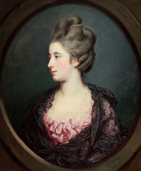 The image shows a portrait of a woman in a side profile facing left. She has an elegant hairstyle, pearls in her hair, fair complexion, a delicate nose, and softly closed lips. She is dressed in a light pink gown with gathered fabric at the bodice, covered by a black lace shawl. She wears a necklace and the attire suggests an 18th-century fashion style. The background is a dark green shade, and the portrait is framed in an oval border.