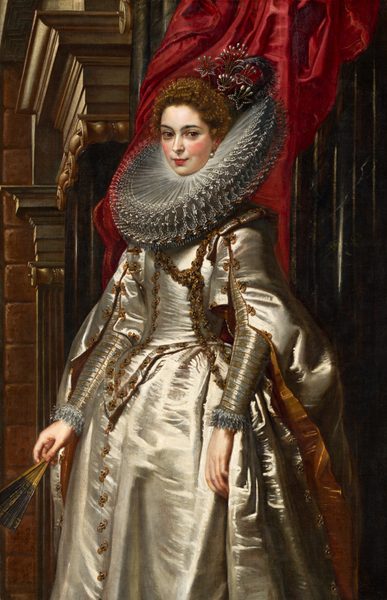 Shown from the knees up, a woman with smooth, pale skin and rosy cheeks wears a satin gown and densely pleated, wide collar in this vertical portrait painting. She stands with her body angled to our left but turns to look at us from the corners of her luminous brown eyes. She has curved, black brows, a straight nose, and her strawberry-red, bow-shaped lips turn up in a slight smile. Her honey-brown hair is tightly curled under an elaborate pearl, gold, and feather headdress in the shape of a bouquet of flowers. The pearl earring in the ear we can see rests against the lace-edged ruff, which presses up against the back of her head and extends to the width of her shoulders. She wears a long-sleeved, champagne-white satin gown trimmed with gold and jewels. A white satin cloak with amber-gold lining falls open from the elbow of each sleeve. The cuffs are edged with layers of narrow lace, and she holds a mostly closed fan in her right hand, farther from us. Both arms hang by her sides. Behind her head and shoulders, cranberry-red drapery billows down from above over forest-green marble columns. Light shines from our left, illuminating a brown pillar and mantel behind the woman, along the left side of the canvas.