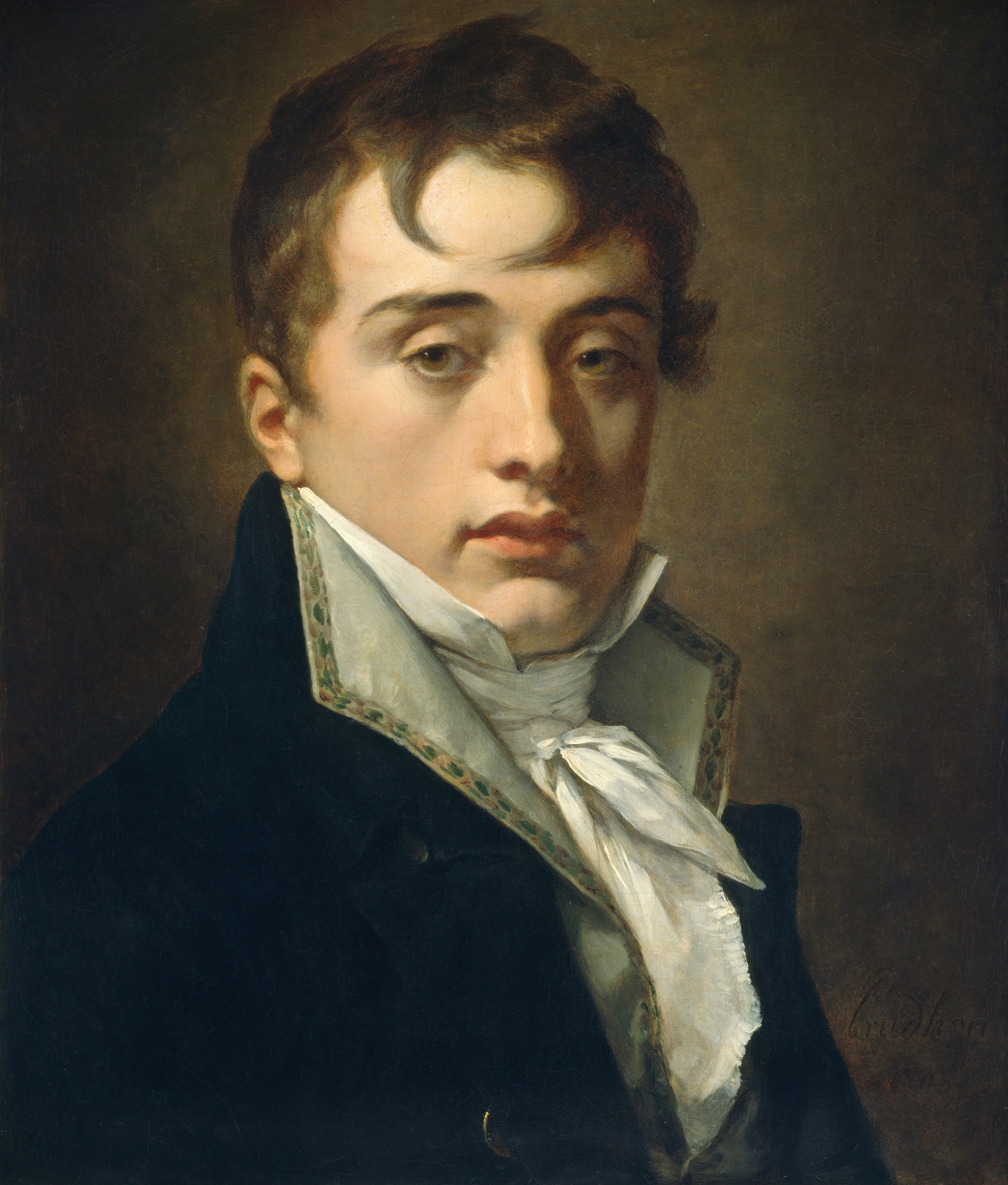 This painting is a portrait of a man. His body is turned towards the right, but he looks directly at us. He has fair skin and dark brown hair with two curling pieces falling onto his forehead. He has well-defined eyebrows, brown eyes, a straight nose, a cleft chin, and light red lips in a neutral expression. He is wearing a dark coat with a high collar that is edged in a yellow and green pattern. Under the coat, he wears a white cravat tied in a voluminous knot. The background is a plain brown color.