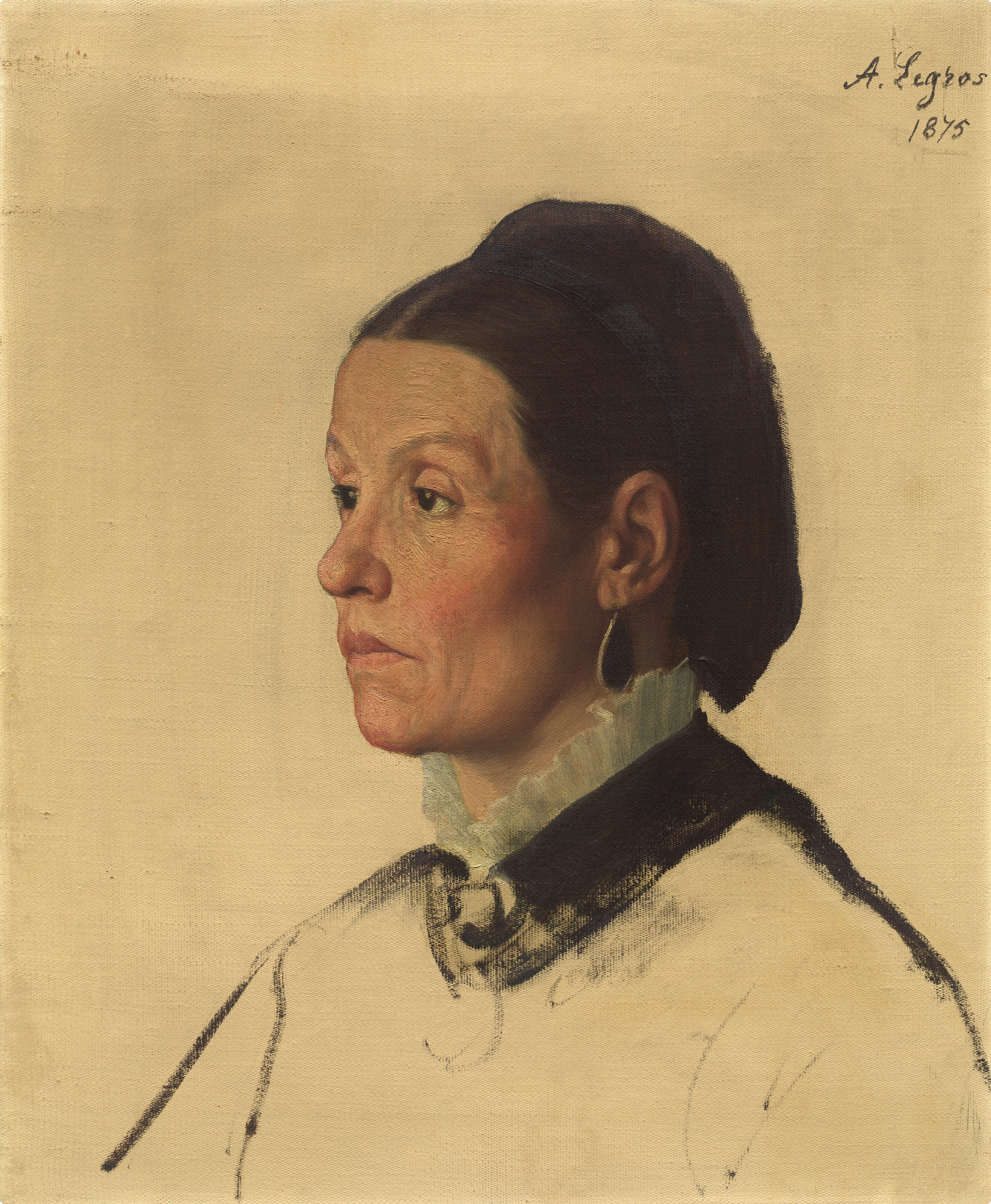 The image portrays a woman in a profile view, with her head turned towards the left. She has medium-length dark hair styled back, wearing a high-collared garment with ruffled edges. She has a sharp nose, defined cheekbones, and a firm chin. The background is a plain, light-colored canvas, and the artist's signature "A. Legros" and the year "1875" are seen in the upper right corner.