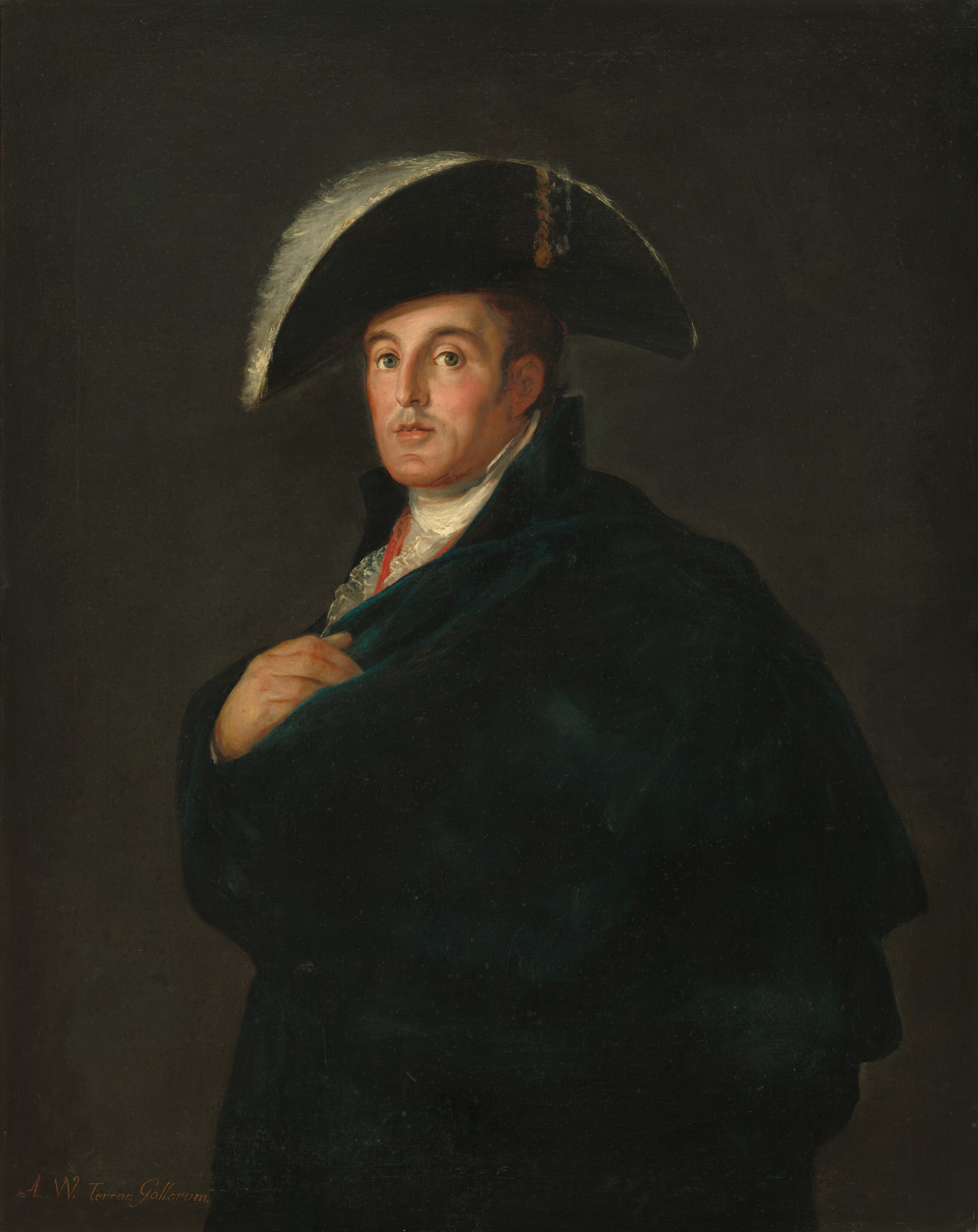 This painting is a portrait of a man from the waist up. He is positioned slightly to the left, with his head turned toward us. He has light skin, green eyes, a faint moustache, and a neutral expression. His hair appears brown, but is mostly concealed by his large, feathered black hat. He is dressed in a dark blue cloak or robe with a white lace collar underneath. One of his hands is down at his side, while the other is placed on his chest. The background is a plain dark gray color.