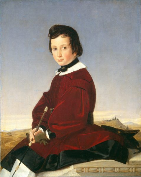 The image depicts a young person seated in a slightly side-facing position. They have fair skin, brown eyes, and medium-length hair styled in a neat cut. The person is wearing a red garment with black accents and a white collar, holding a slender stick in gloved hands. In the background, there is a pastel sky, rolling hills, and faint buildings. The setting appears to be outdoors, with the person seated on a stone ledge with decorative elements.