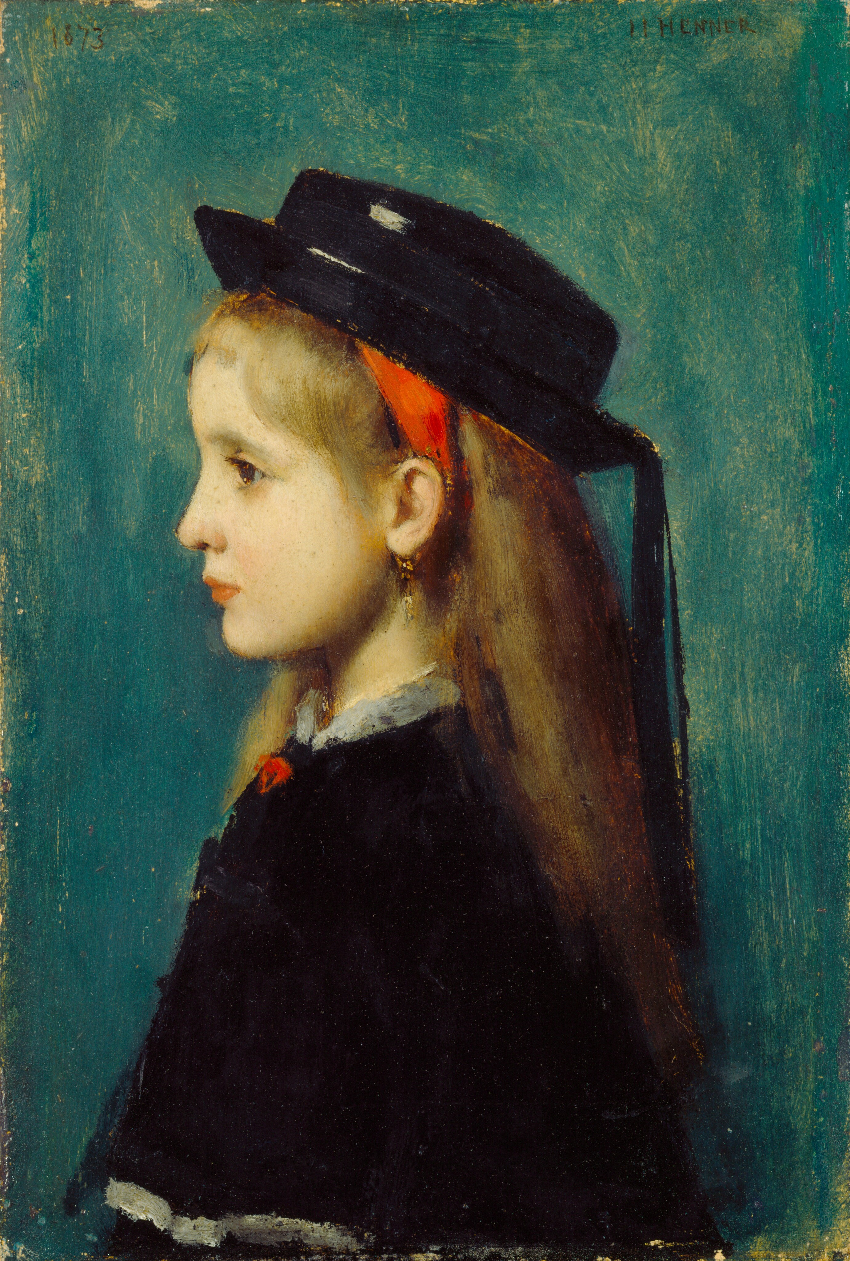 A young girl with long blond hair and smooth, pale skin is shown from the chest up facing our left in profile in this vertical portrait painting. She has large brown eyes under faint brows, a petite nose, and her coral-pink lips are closed. Her hair, which falls below her shoulders, is held in place with a scarlet-red headband, and short bangs fringe her forehead. A black hat with an upturned brim and gently curving crown sits on the back of her head with ribbons streaming down her back, and a loosely painted gold earring dangles from her ear. Her black cape has a pewter-gray collar and hem around the shoulders. A touch of red at the chest suggests a bow. The background is streaked with teal blue over pale yellow. The artist dated the upper left corner, 1873, and signed the top right, “J J HENNER.”