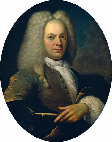 The portrait depicts a man facing slightly to the right, with his head turned towards the viewer. He has arched eyebrows, a pronounced nose, and a slight smile. He has long, curly, grayish-white hair falling to his shoulders. The man is dressed in a brown coat with buttons, along with a white ruffled cravat around his neck. His coat sleeves have white ruffled cuffs. One of his hands is visible, resting on his lap. The background is a mix of dark brown and green tones.
