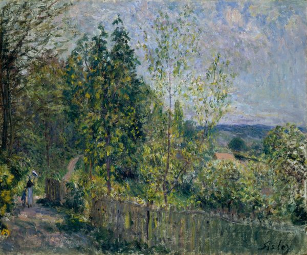 This painting depicts a scene where a winding path on the bottom left leads into a wooded area. Tall green trees occupy the left side of the painting, while on the right a small gap shows a hilly, dark blue horizon line with more green foliage and the red roof of a building. The sky above is light blue with dots of white and lilac purple. Across the bottom of the painting, a wooden fence lines a light brown path that leads through the woods. Near the bottom left corner, small strokes of paint suggest two people walking along the path away from us, one adult and one child. The color palette is predominantly green with hints of light brown, along with soft blues and purples in the sky. The brushstrokes are loose and impressionistic, with paint applied in short, overlapping lines and dots.