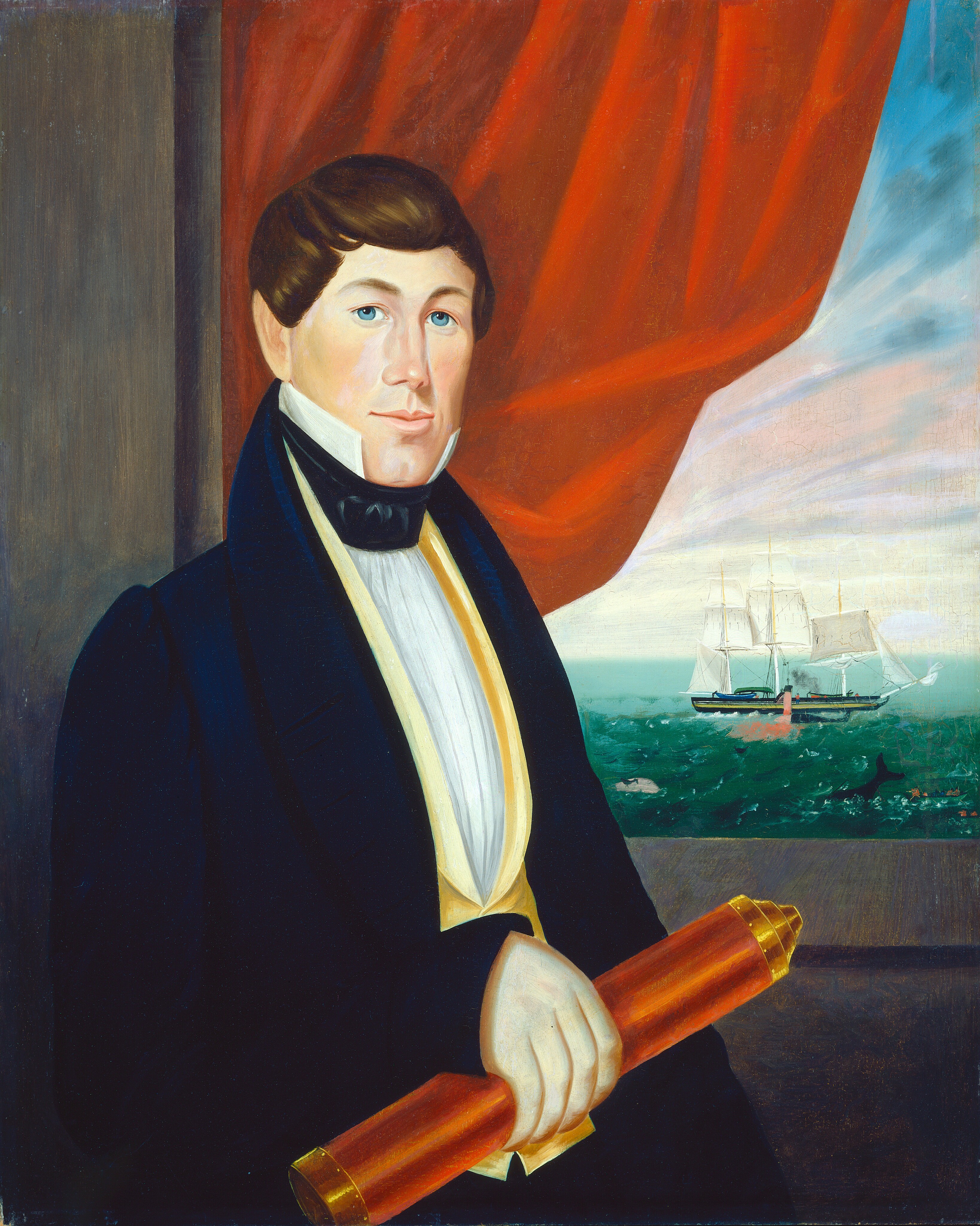The image shows a portrait of a man standing with his body turned slightly to the right. He has light blue eyes and short brown hair with a side part. He is dressed in 19th-century formal clothing, including a navy blue coat, white shirt with a high collar, black neckcloth, and a gold waistcoat. He holds a red and gold cylindrical object in his right hand. The background displays a maritime scene with a red curtain partially drawn to reveal the sea and a sailing ship in the distance.