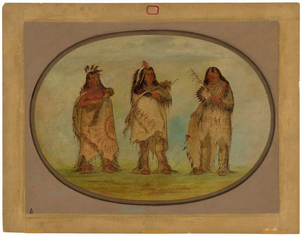 The image shows three individuals standing side by side in full body view. They have long dark hair with feather decorations. They are dressed in traditional robes with fringes and patterns. Each holds specific objects: fur, quiver with arrows, and a feather fan. The background is plain with earth tones, emphasizing the individuals and their attire.