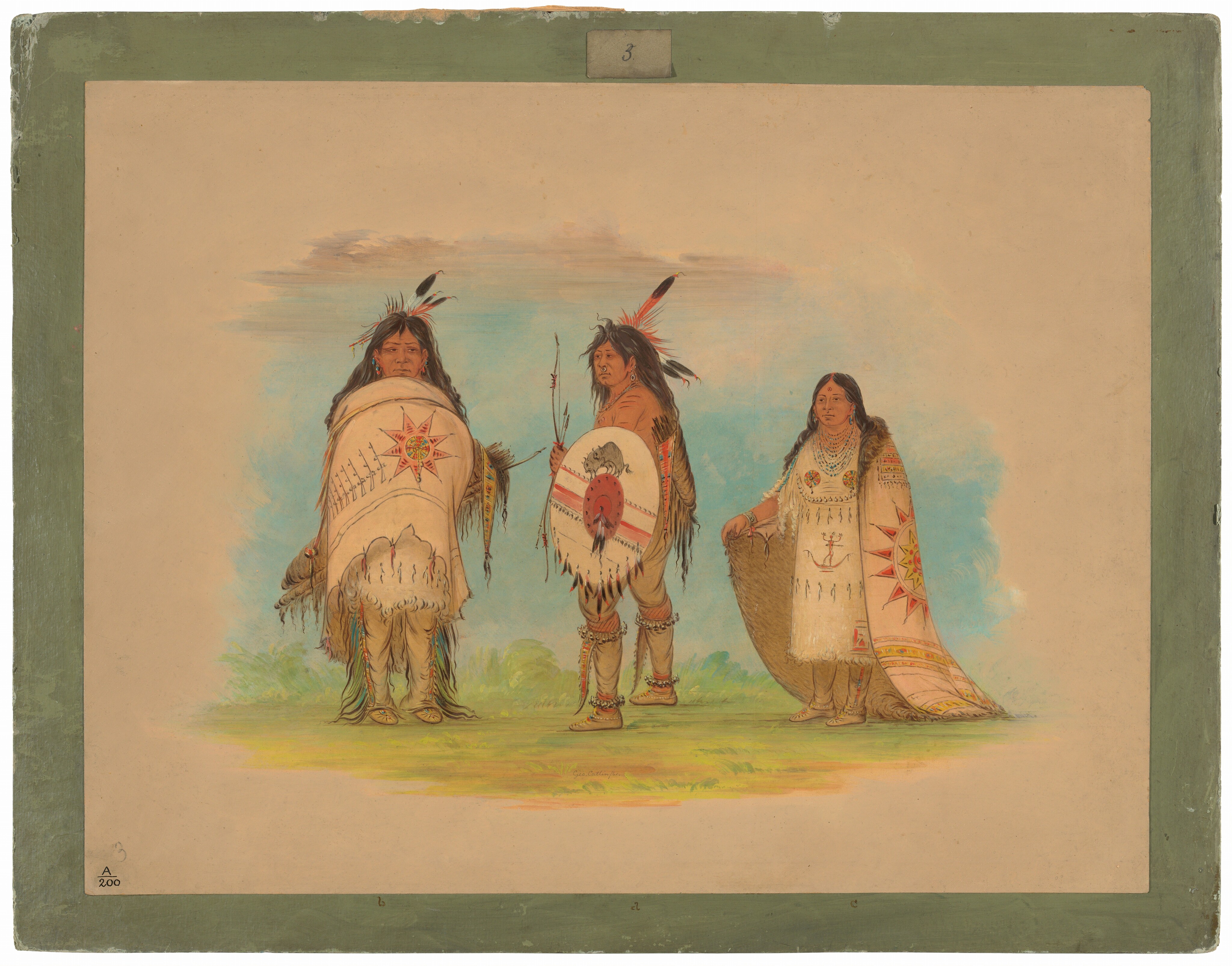 The image shows three individuals standing side by side. The person on the left wears a robe and has long dark hair with feathers. The middle person, also with dark hair and feathers, is holding a staff and a shield. The person on the right has long dark hair, wearing a fur-lined robe over a decorated dress. They all wear traditional clothing with vibrant patterns and colors. The background suggests an open natural setting with grass and a cloudy sky.